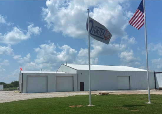qvortex logo flags outside office