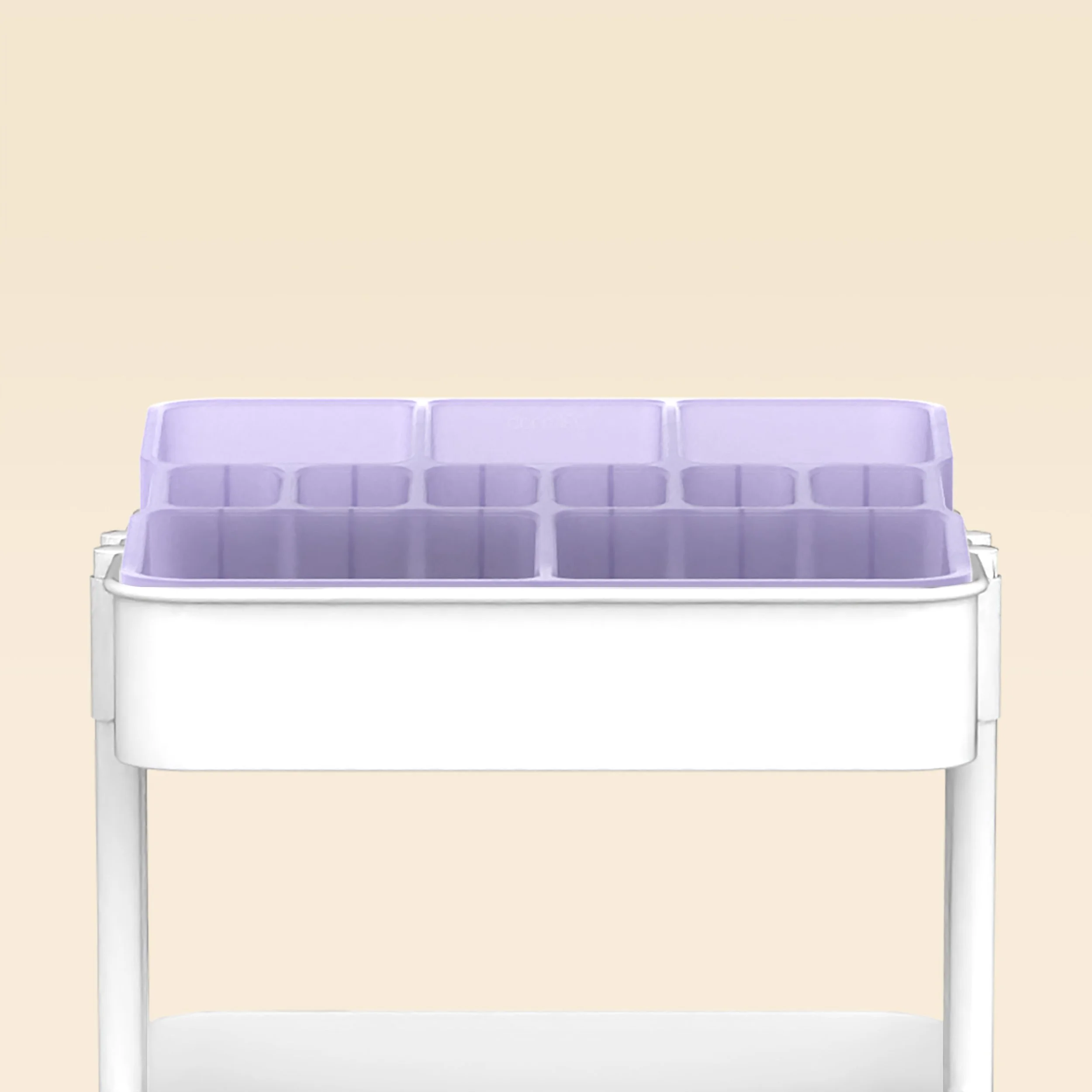 A white storage cart with a purple organizational insert on top, set against a beige background.