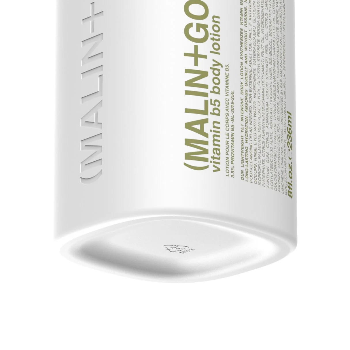 A white bottle of anti-aging body lotion with gold and green text labeling it as 'Marine + G5 vitamin b5 body lotion'.