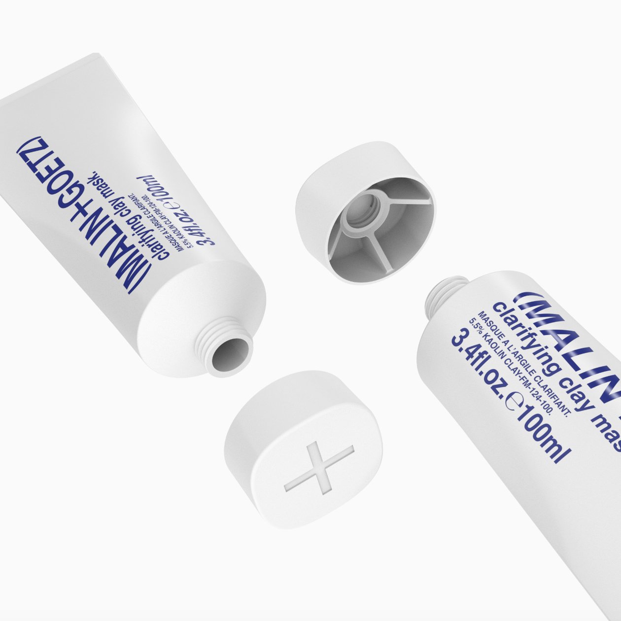 Two white tubes of MALLIN clarifying clay with open caps, one showing the nozzle and the other showing the interior. A white cap with a plus sign is also visible.