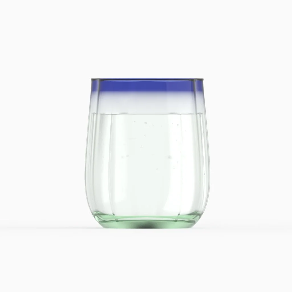 A clear glass with a slight green tint at the bottom, filled with water, and a blue rim at the top against a white background.