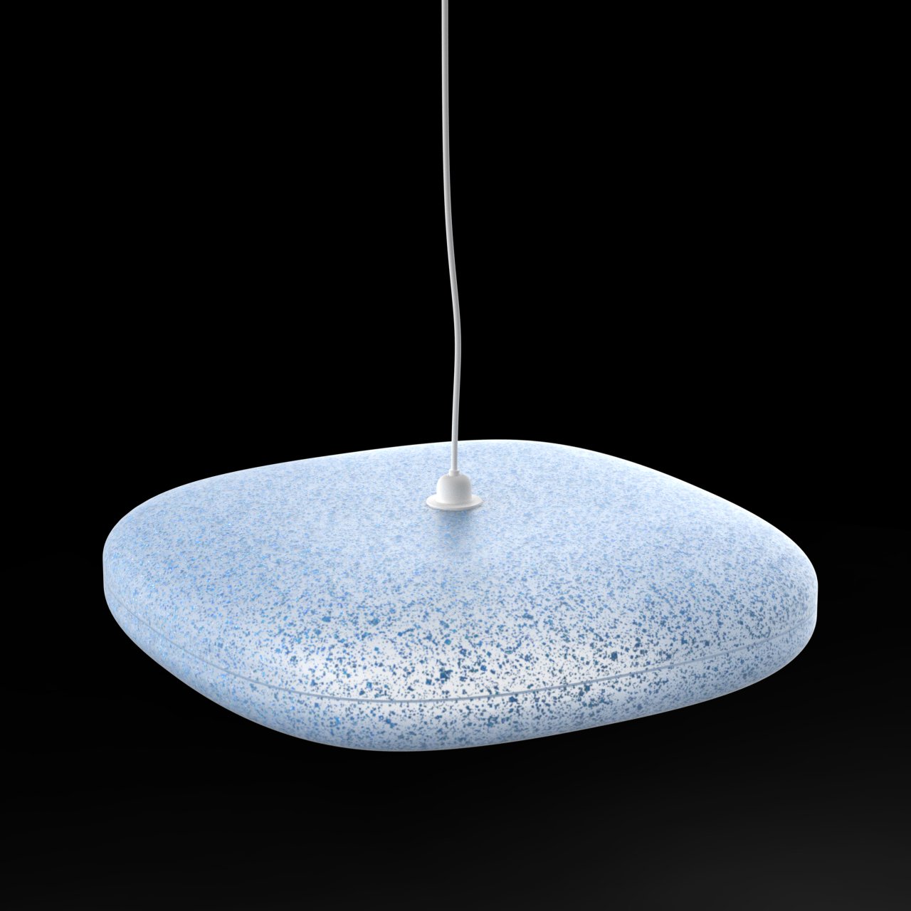 A white and blue speckled ultrasonic diffuser with a white cord on a black background.
