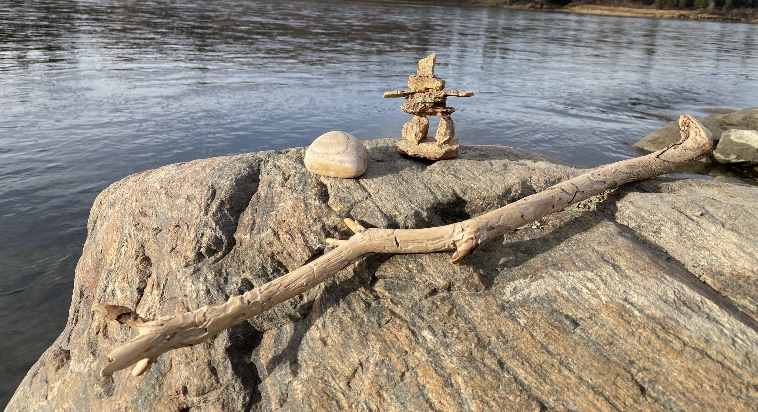 Symbols on rock near river