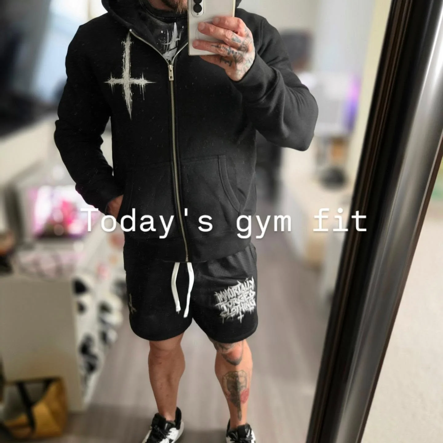 Wearing the essential fleece zip hoodie (super comfy and warm) it fits good! I'm wearing an XL here. Then I have the oversized "STILL I RISE" shirt and the drawstring shorts to match! Solid fit if I say so myself! 

Pick this up at Immortal