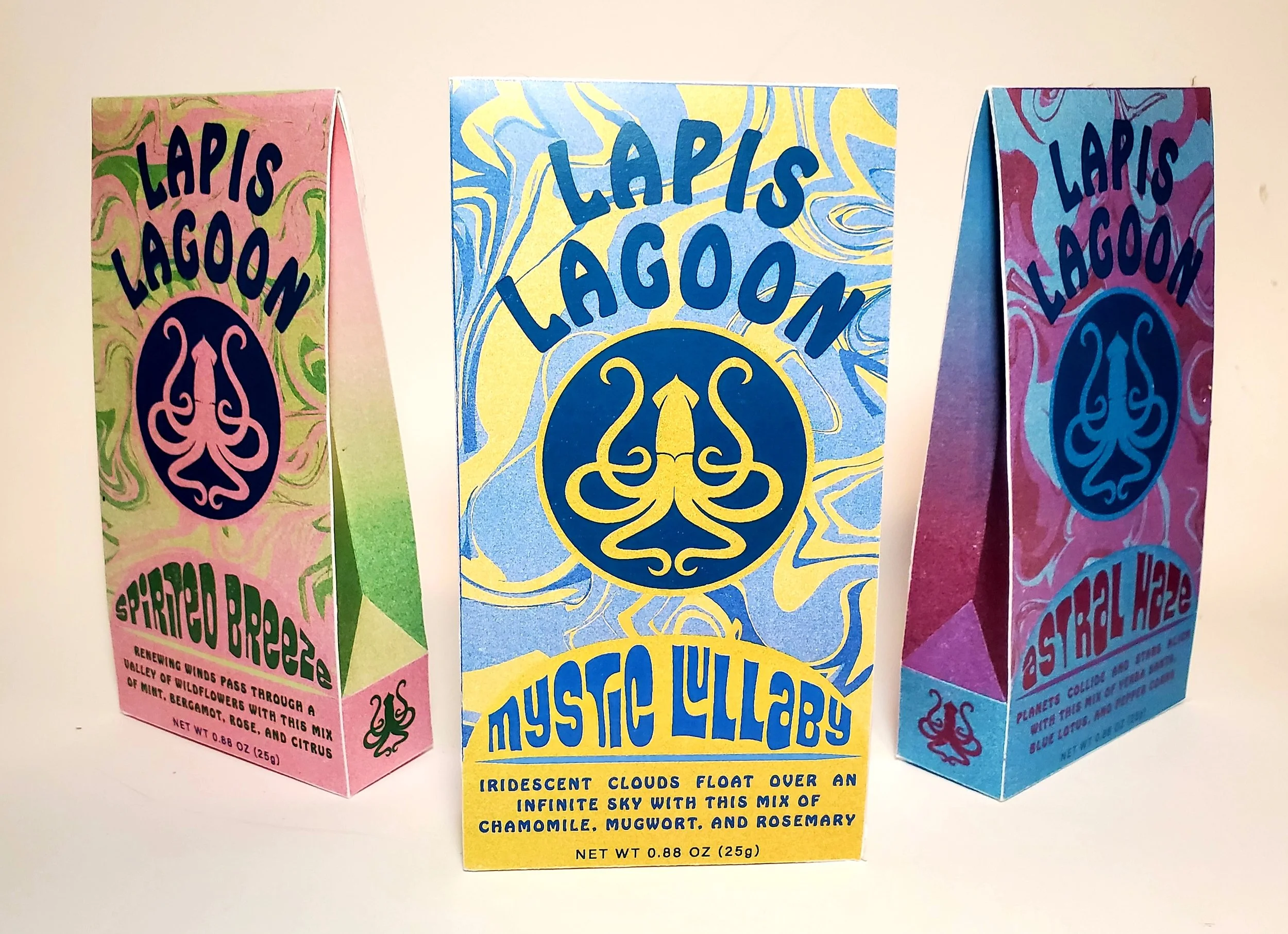 Three colorful paper cartons of incense labeled Lapis Lagoon with a stylized octopus logo, pastel swirled backgrounds, and descriptive text about the scent and ingredients.
