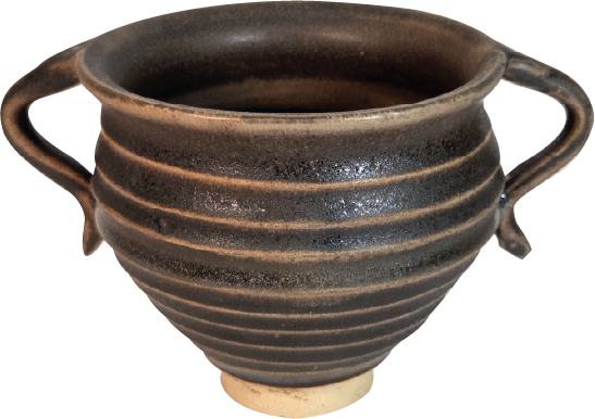 A ceramic pot with horizontal ridges and two handles.