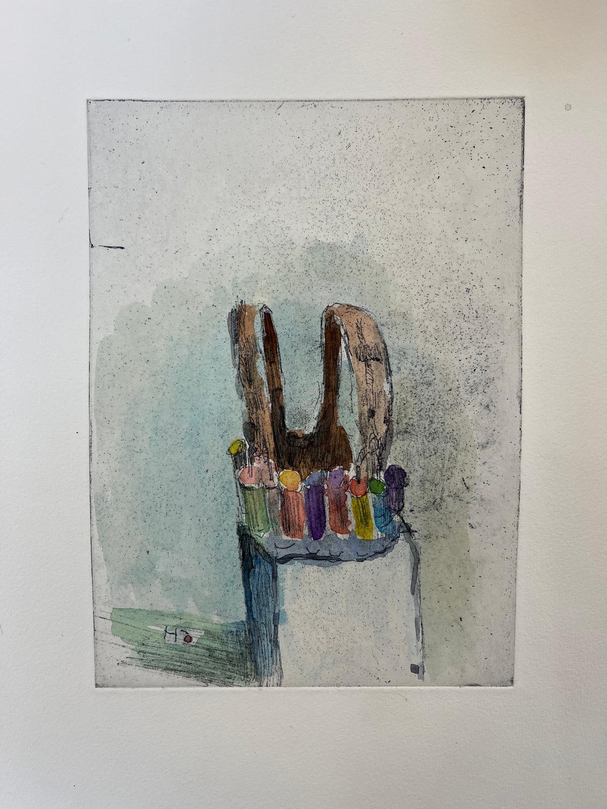 A watercolor painting depicting a rustic wooden chair with colorful candles on it, set against a plain background.