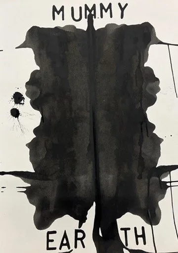 A black inkblot resembling a butterfly or moth on a white background, with the words 'MUMMY' at the top and 'EARTH' at the bottom.
