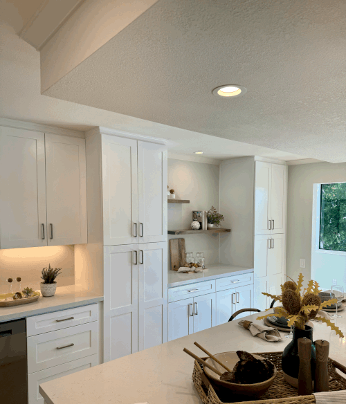 White shaker kitchen with quartz countertops