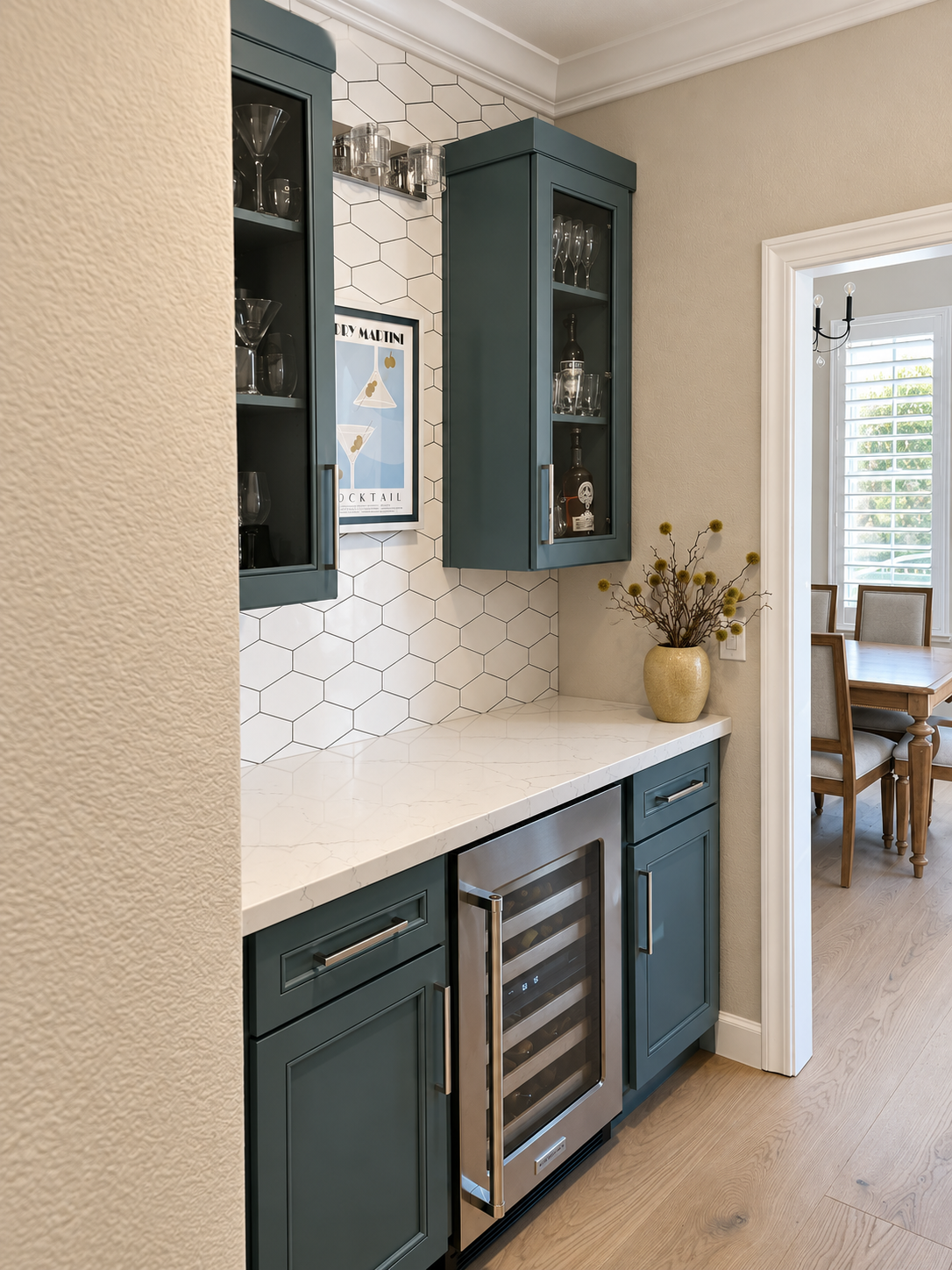 Built-in bar with deep green cabinets, glass-front uppers, a wine fridge and hexagon tile, kitchen remodel in Cupertino, CA