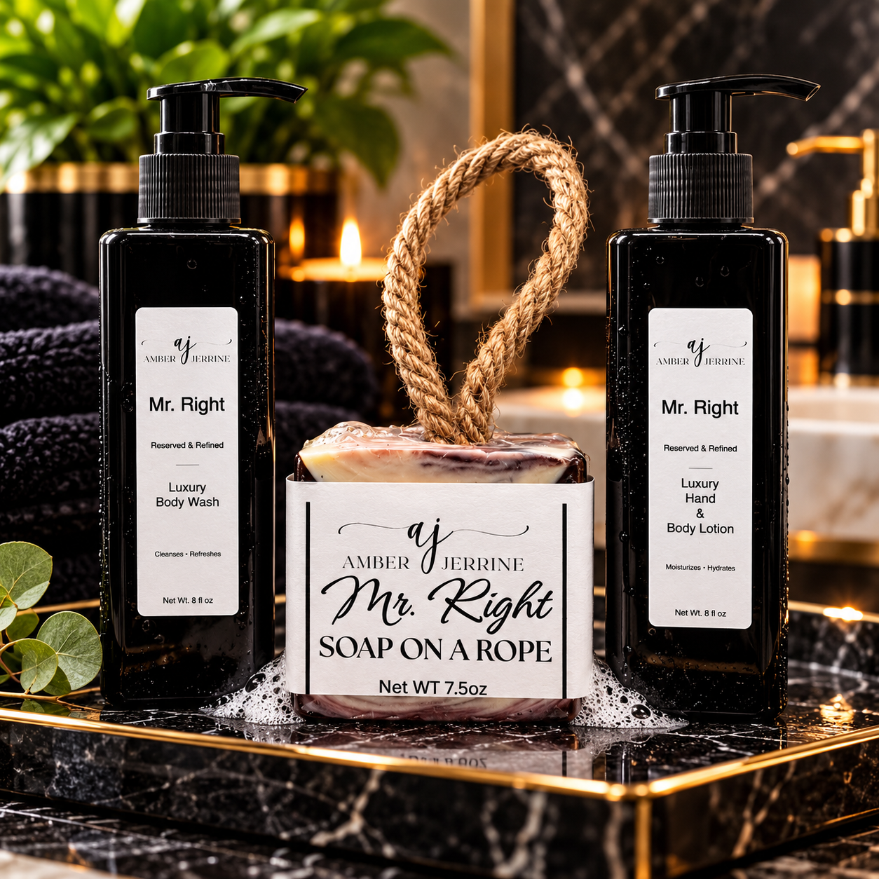 Amber Jerrine Mr. Right collection featuring Luxury Body Wash, 7.5 oz Soap on a Rope, and Luxury Hand & Body Lotion displayed in an elegant black-and-gold bathroom setting.