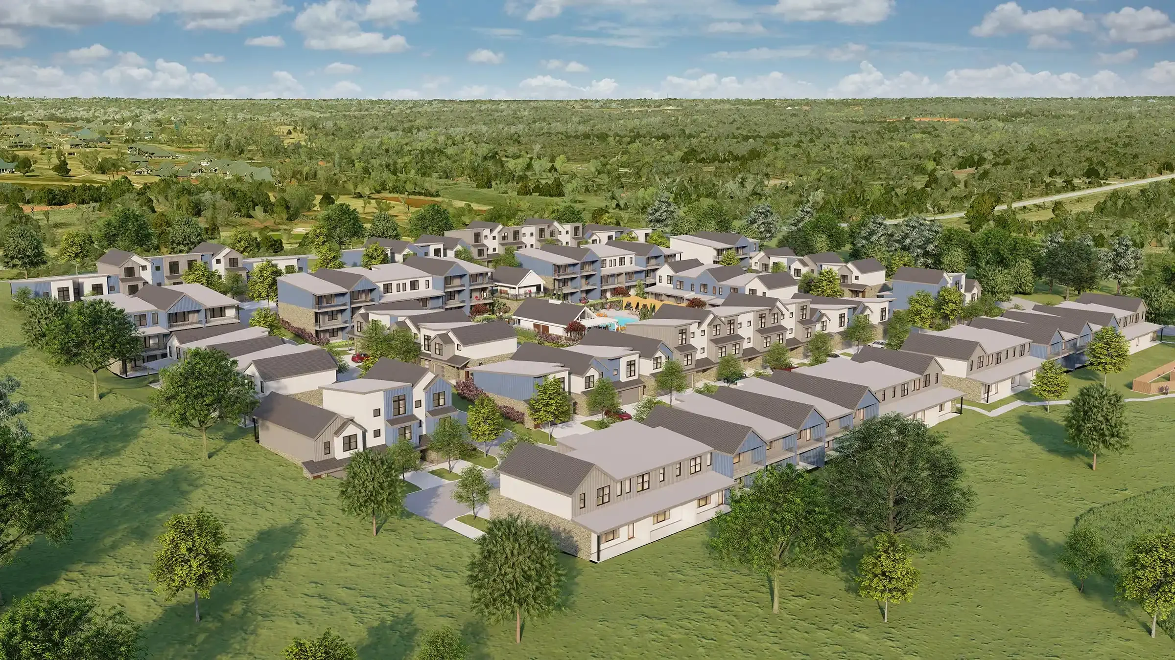 Aerial view of a residential community with modern houses, greenery, and a swimming pool, set in a suburban area with forested landscape in the background.