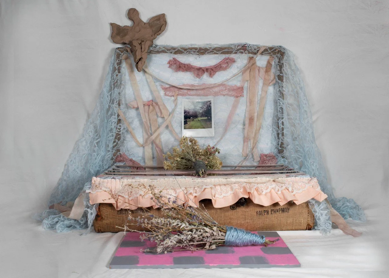 My sister at her mother's grave.jpg