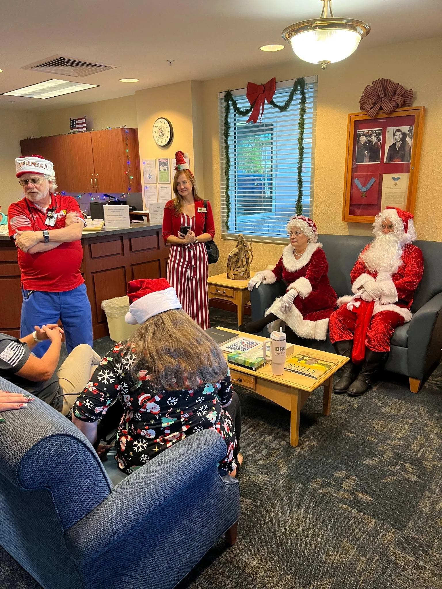 Santa, Ms. Kringle and Santa's helpers