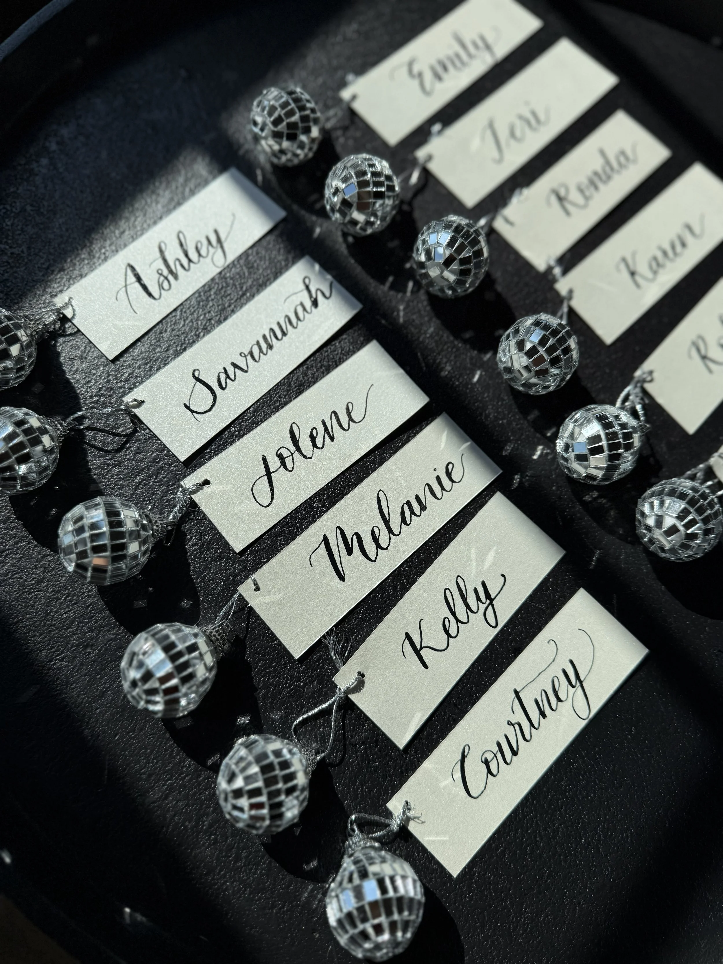 Custom pointed-pen calligraphy place cards, favors, escort cards with disco ball