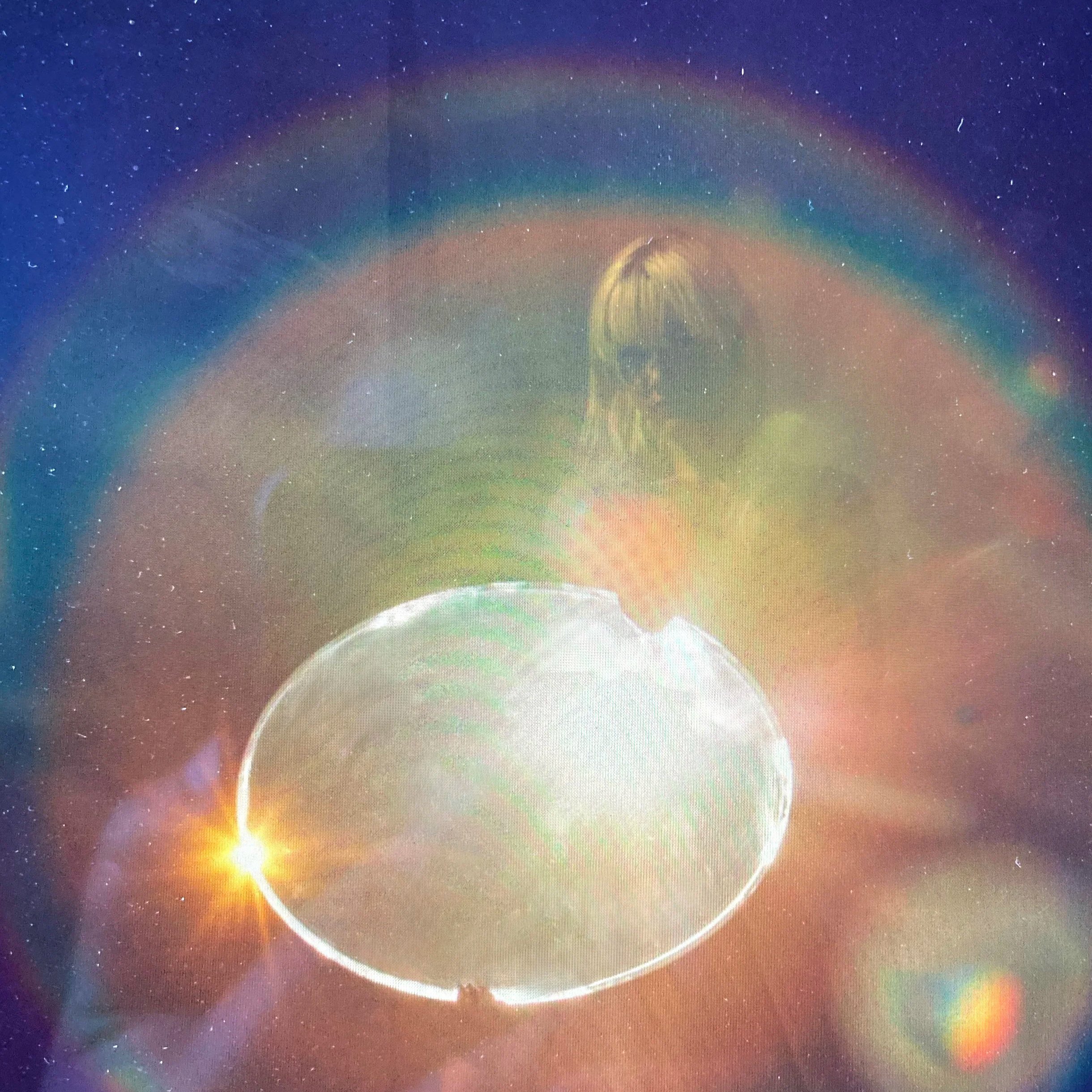 POSES reflections and flares. Futuristic digital artwork depicting a female figure with glasses above a glowing, ringed planet, surrounded by rainbow-colored halos and a starry space background.