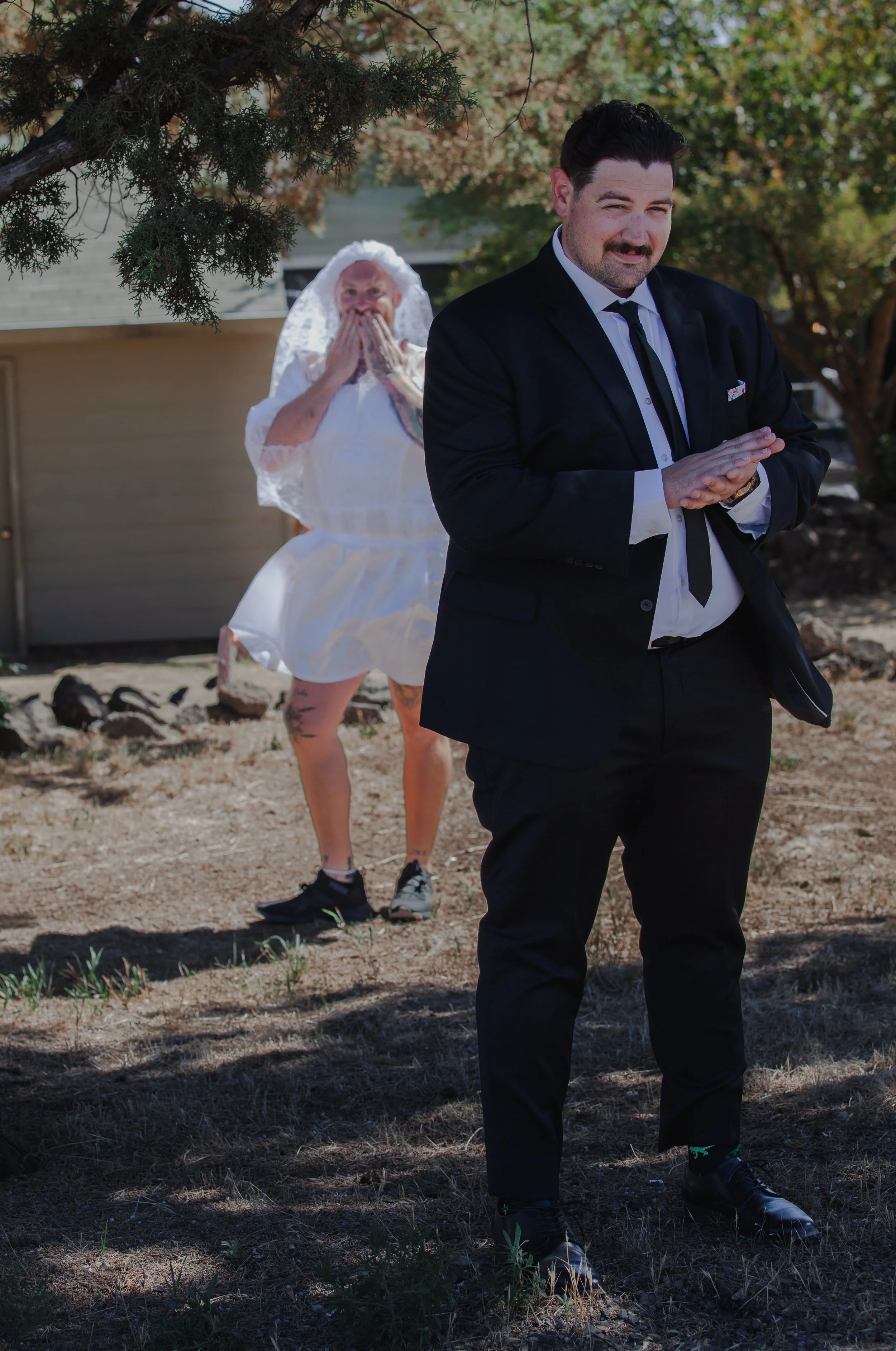  Groom's best friend surprising him during a first-look prank at a Central Oregon ranch wedding 