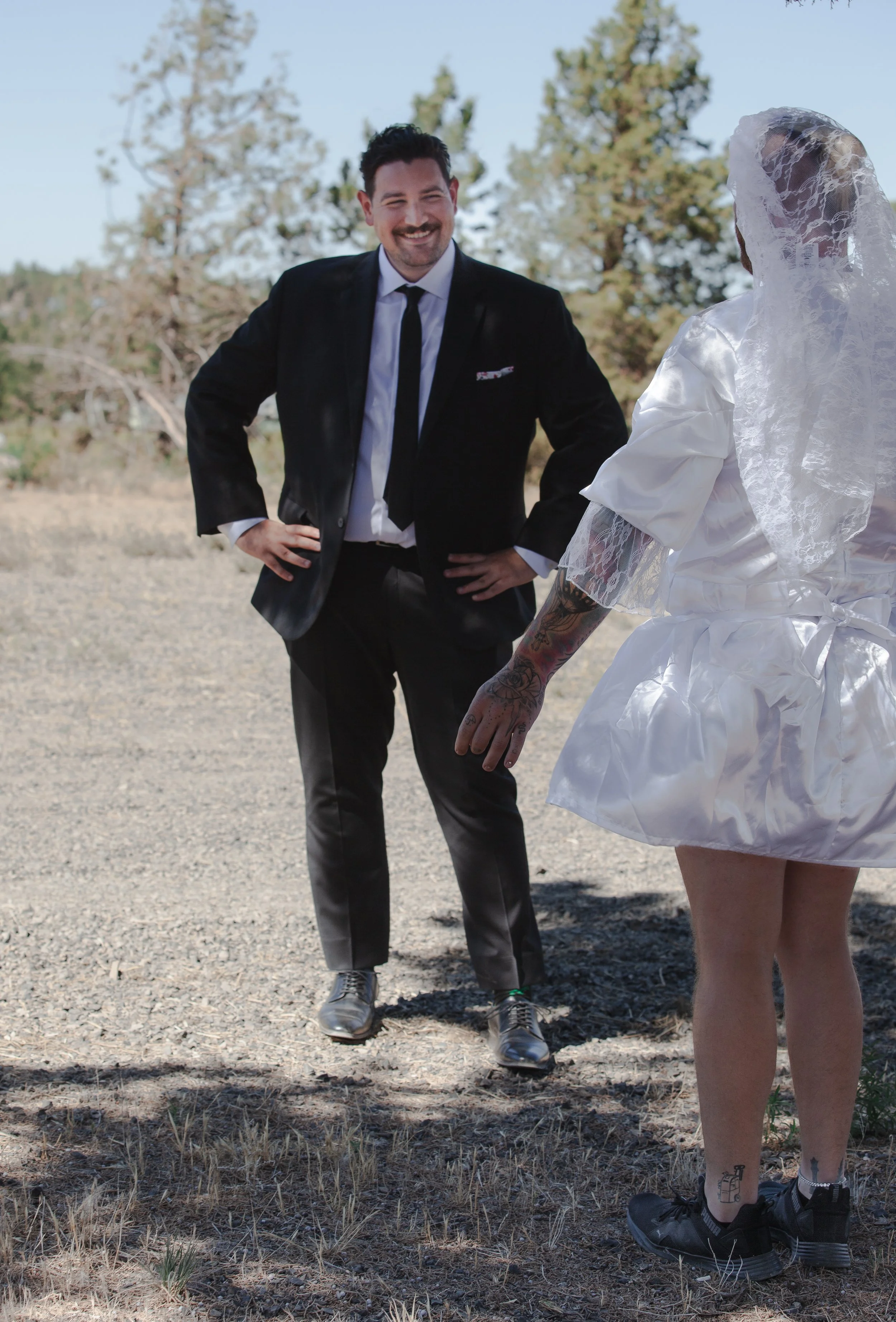  Groom's best friend surprising him during a first-look prank at a Central Oregon ranch wedding 
