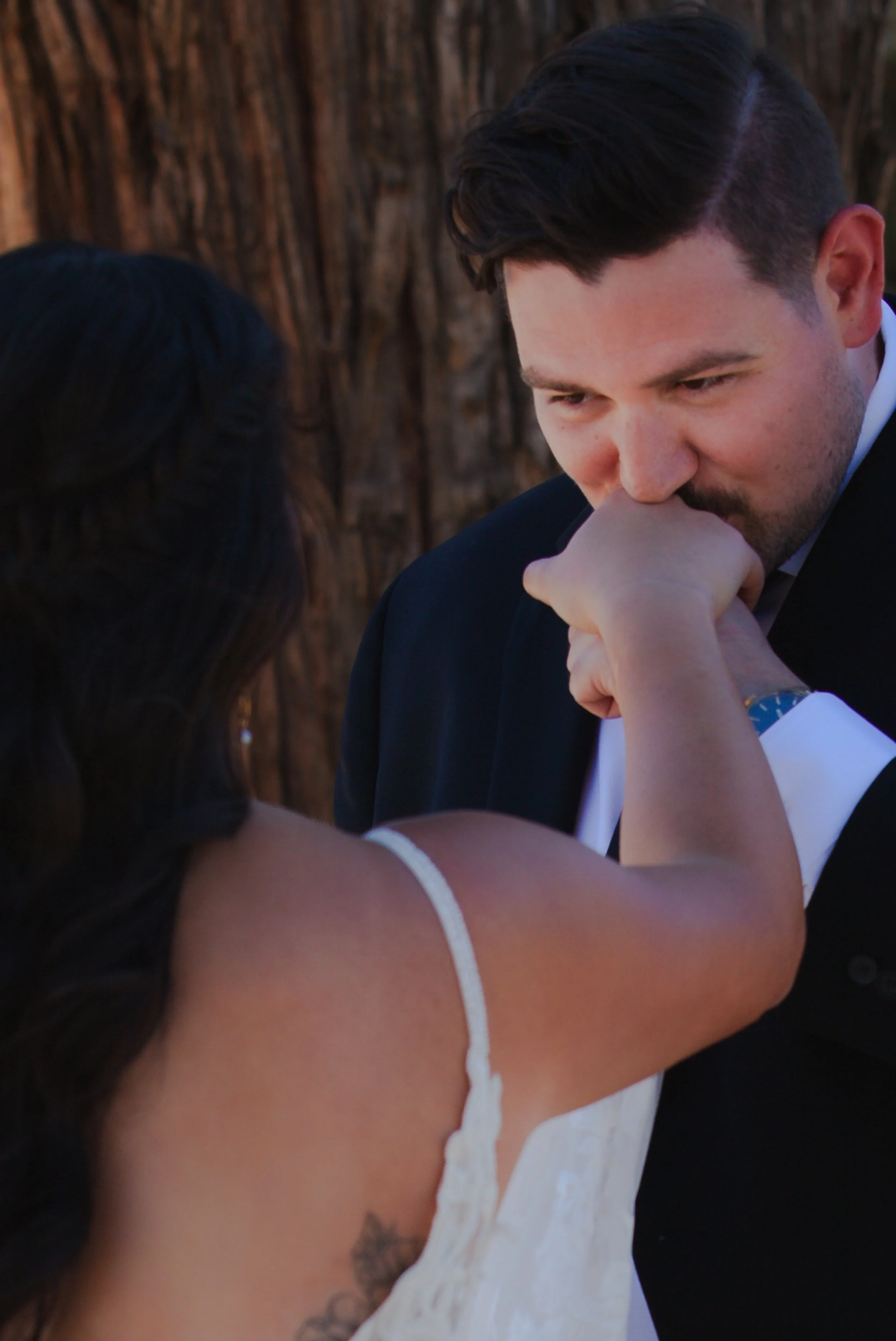  Bride and groom sharing a quiet moment during first look before their outdoor ranch wedding ceremony in Central Oregon 