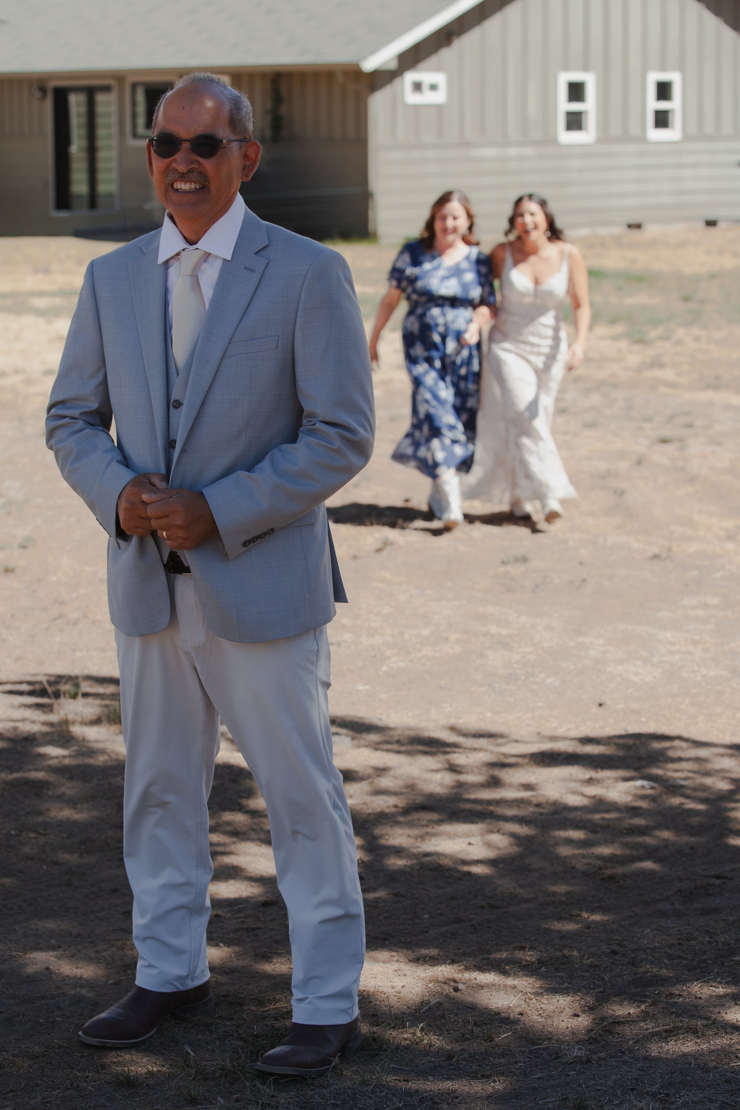  Bride and her father during a first look before her private ranch wedding ceremony near Bend, Oregon 