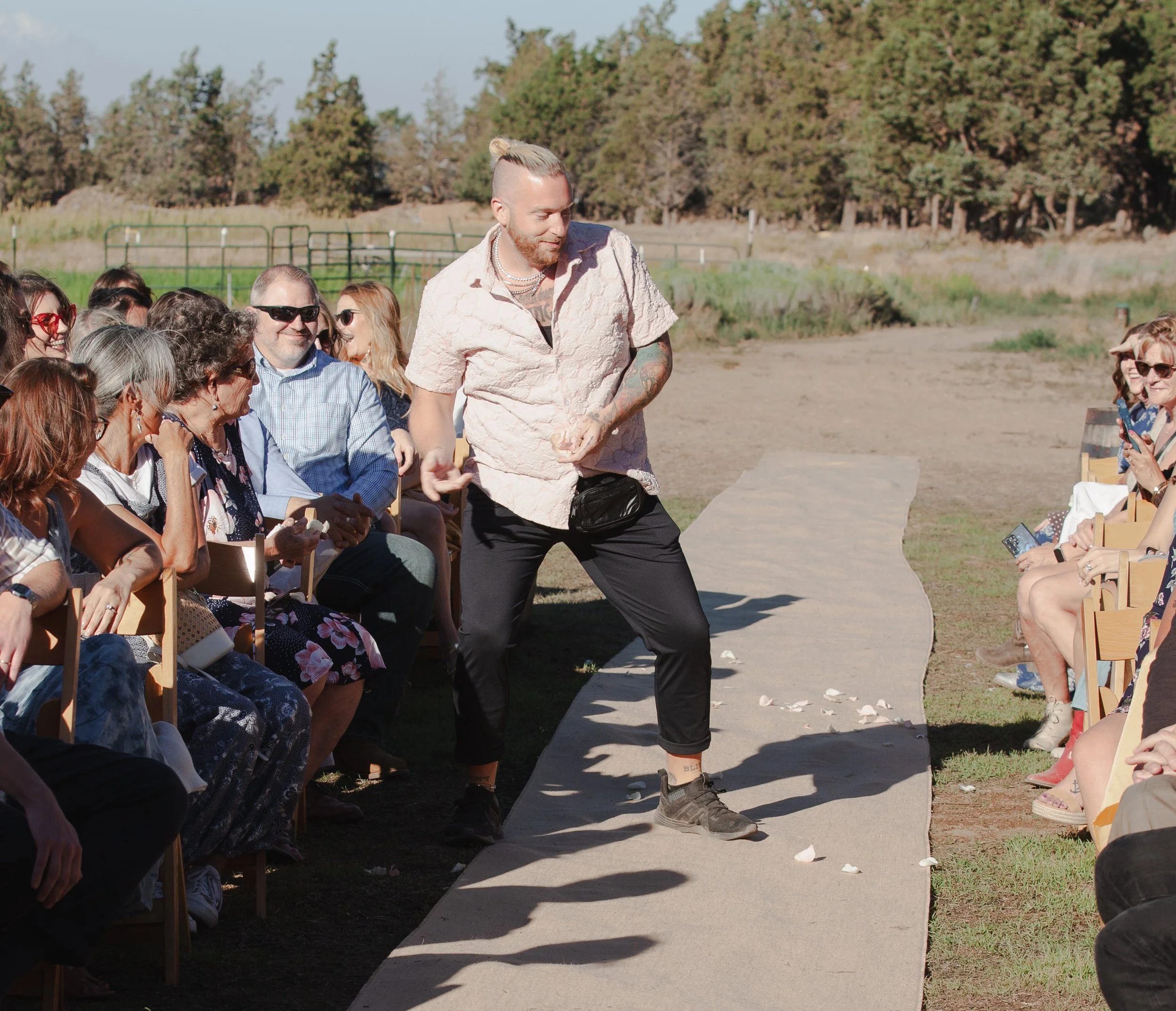  Flower boy throws petals for Central Oregon private ranch wedding in Bend, Oregon 