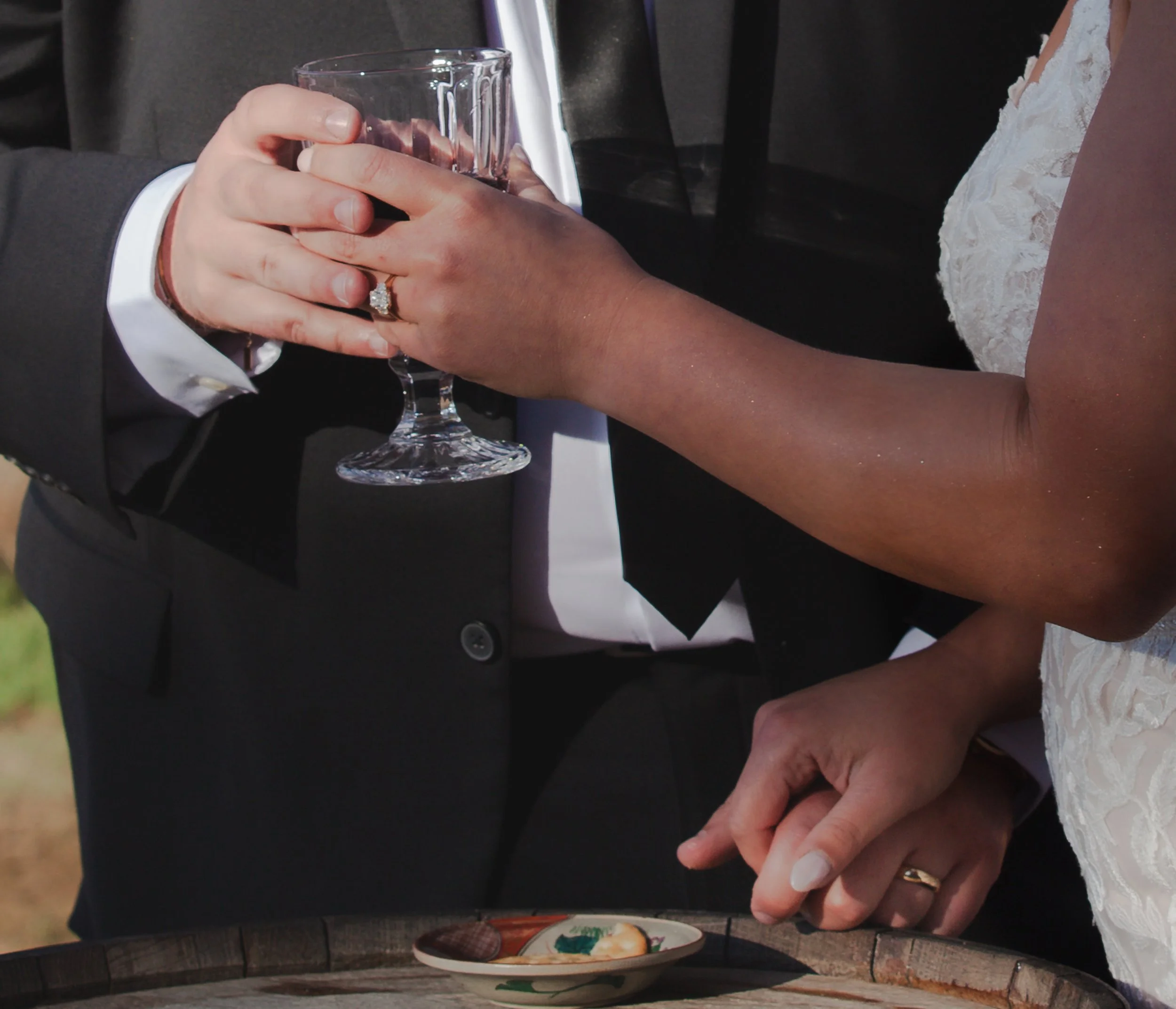  Bride and groom taking communion together during their Christian wedding ceremony in Central Oregon 