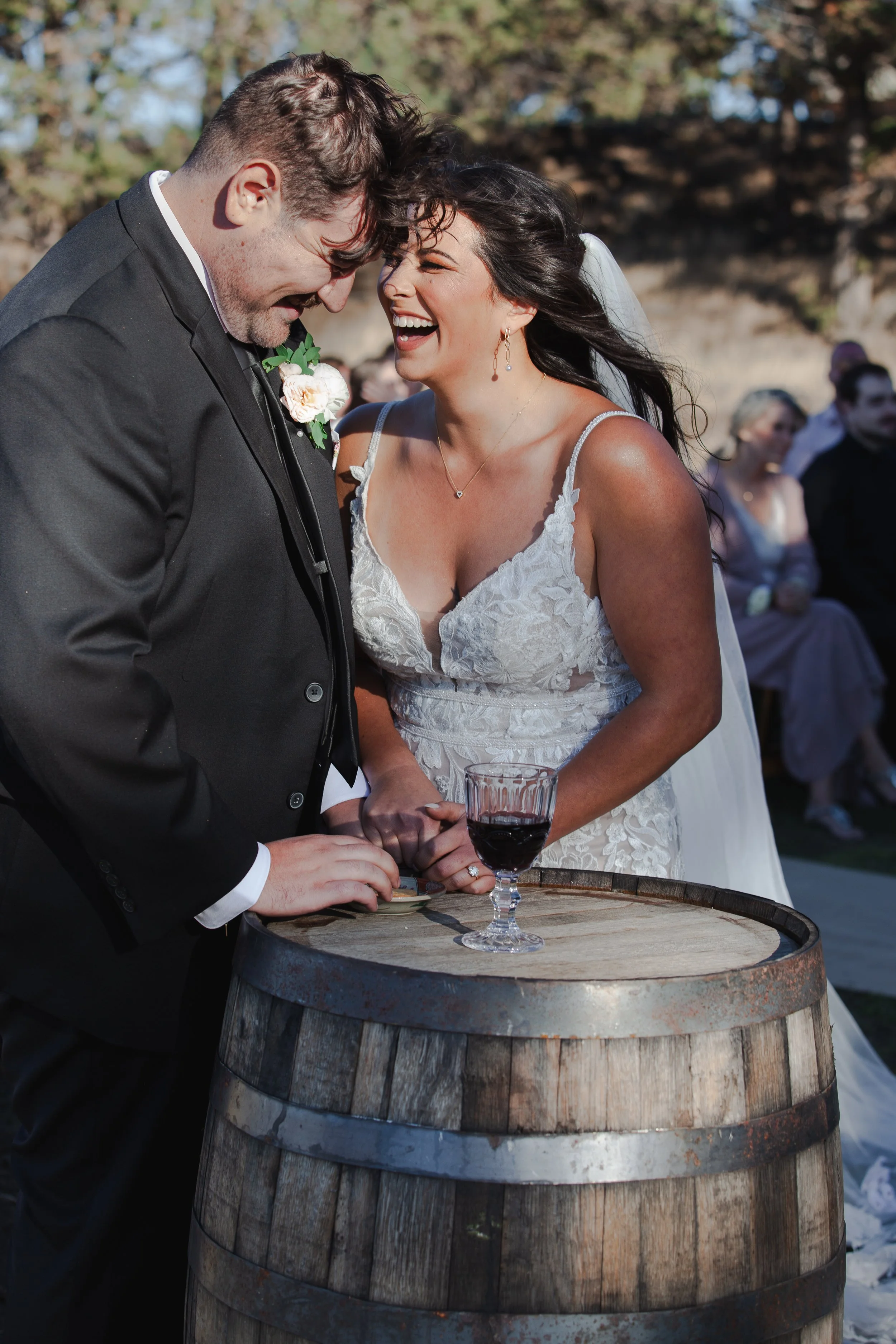  Bride and groom taking communion together during their Christian wedding ceremony in Central Oregon 
