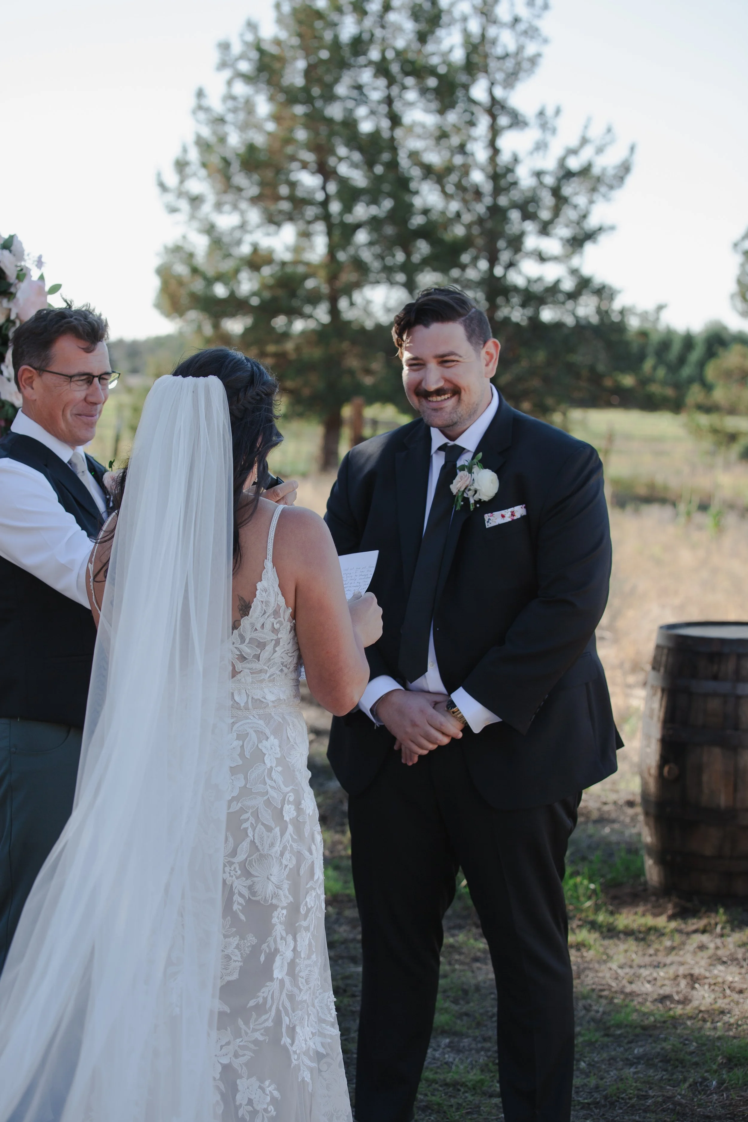  Emotional wedding vows during a faith-centered outdoor ceremony in Bend, Oregon 