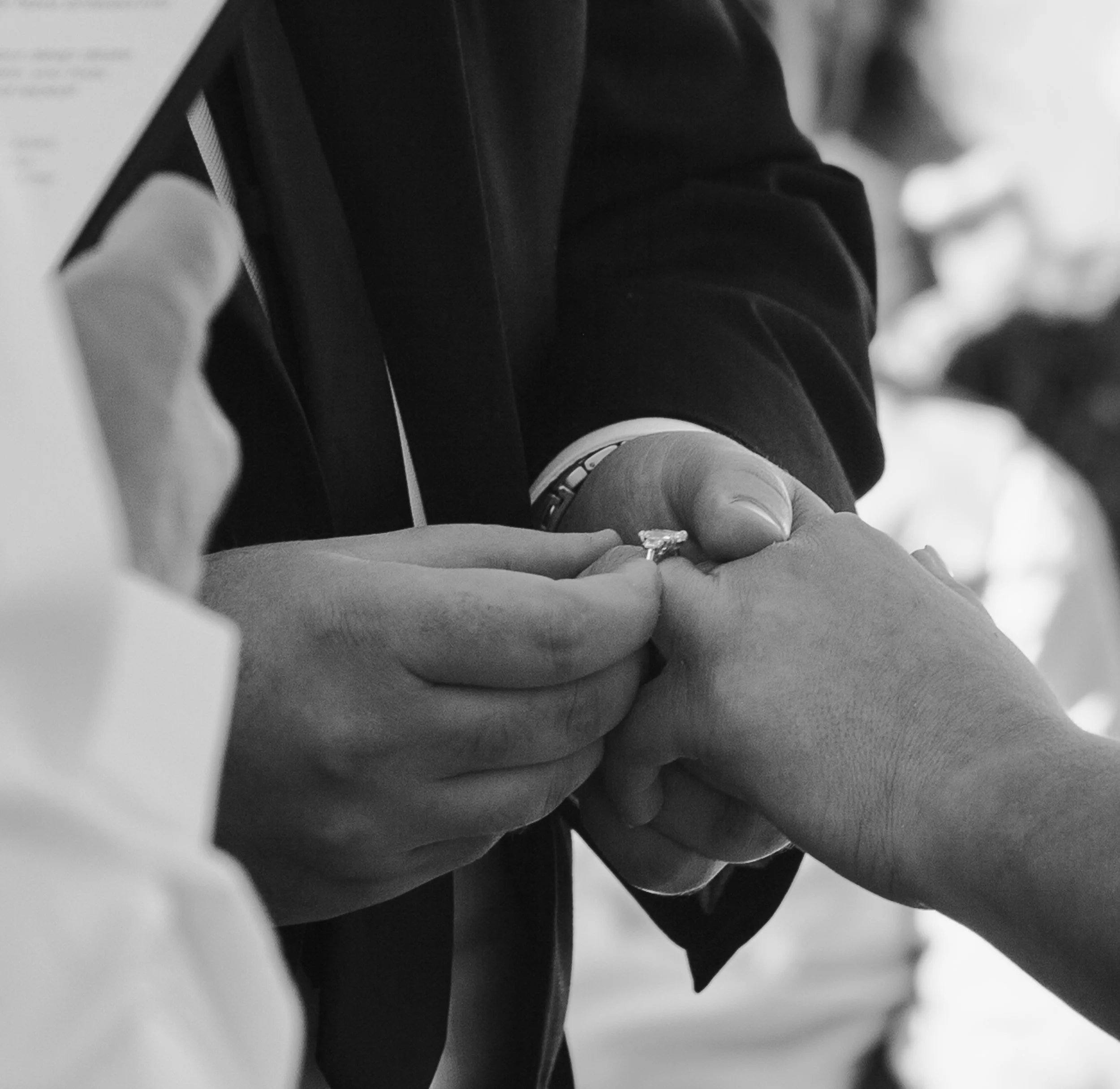  Close-up of the couple exchanging wedding rings during their private ranch ceremony in Central Oregon 
