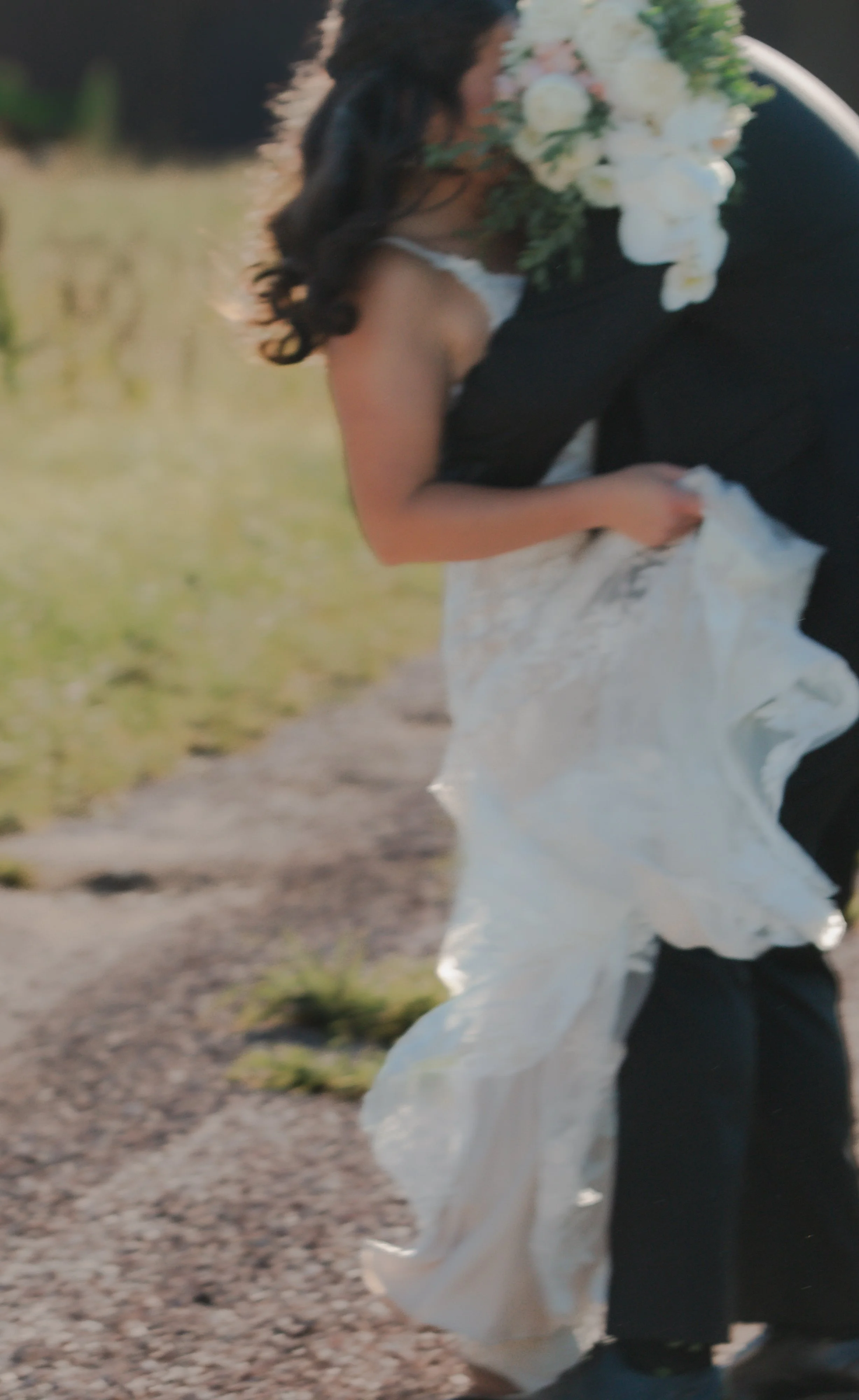  Editorial bridal portraits with white flowers and mountain views at a private ranch wedding in Central Oregon 