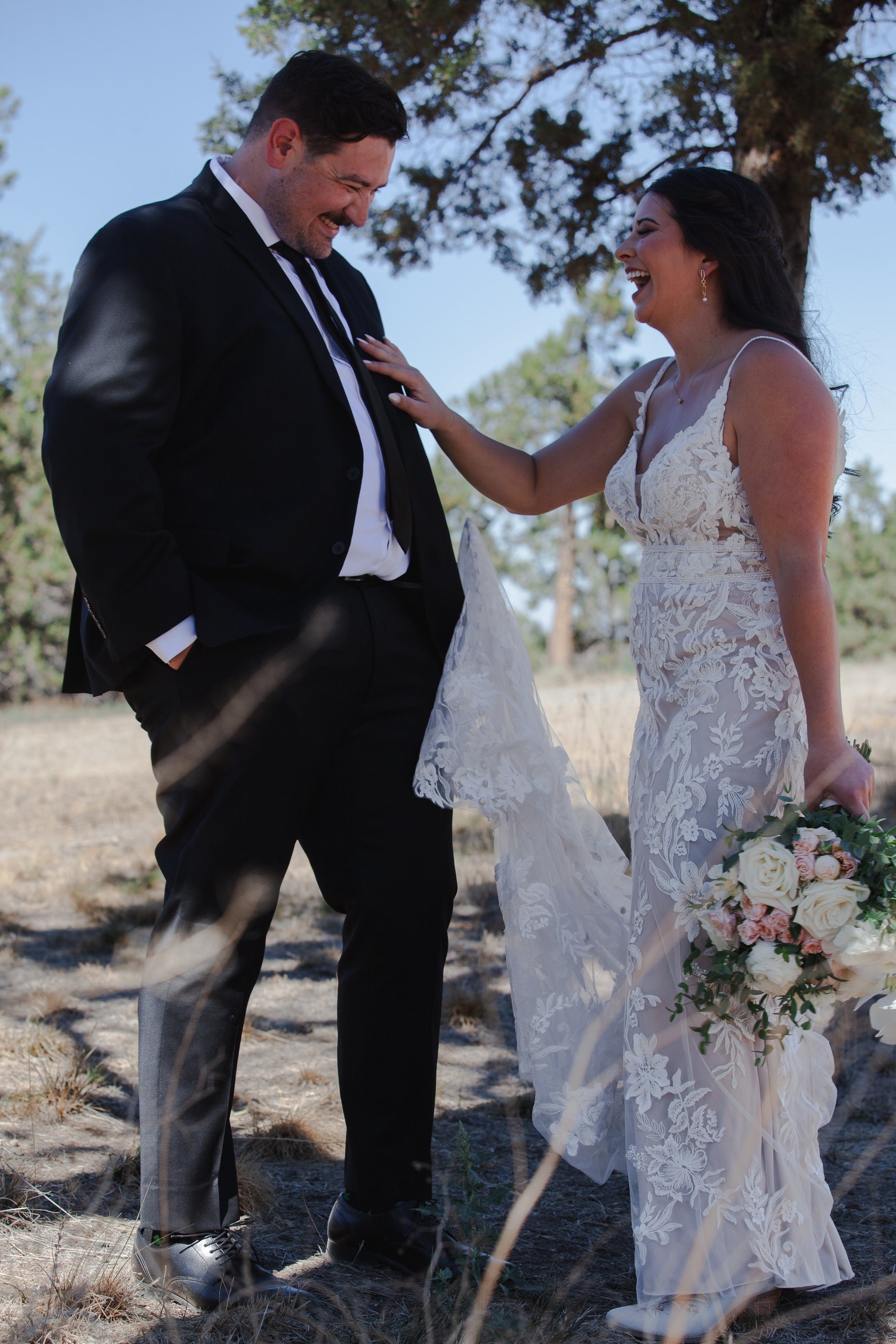  Editorial bride and groom portrait in the High Desert landscape after their Central Oregon ranch wedding 
