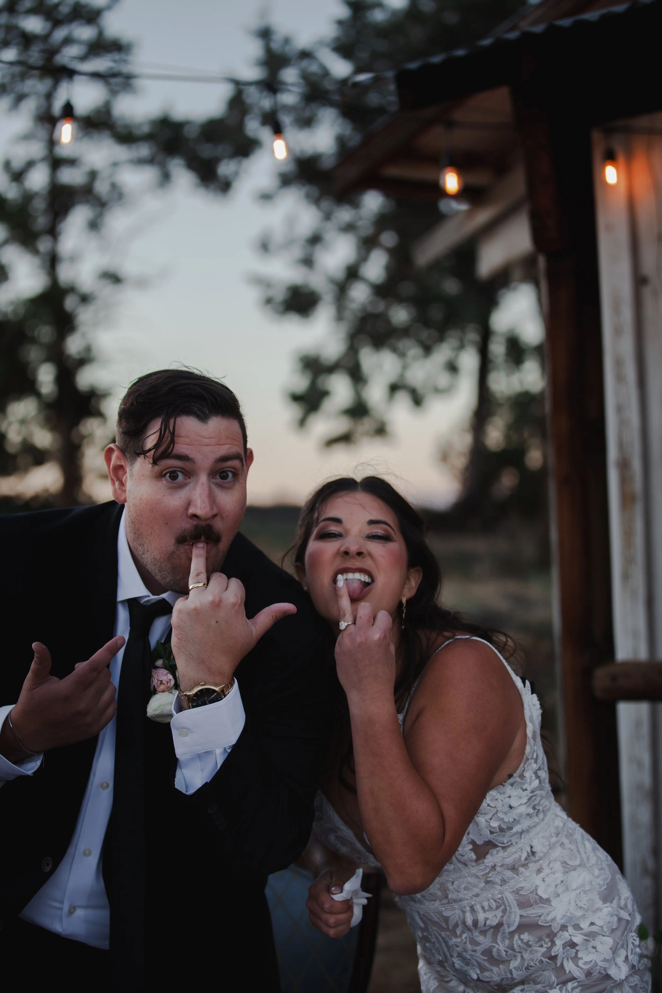  Bride and groom celebrating during their relaxed private ranch wedding reception near Bend, Oregon 
