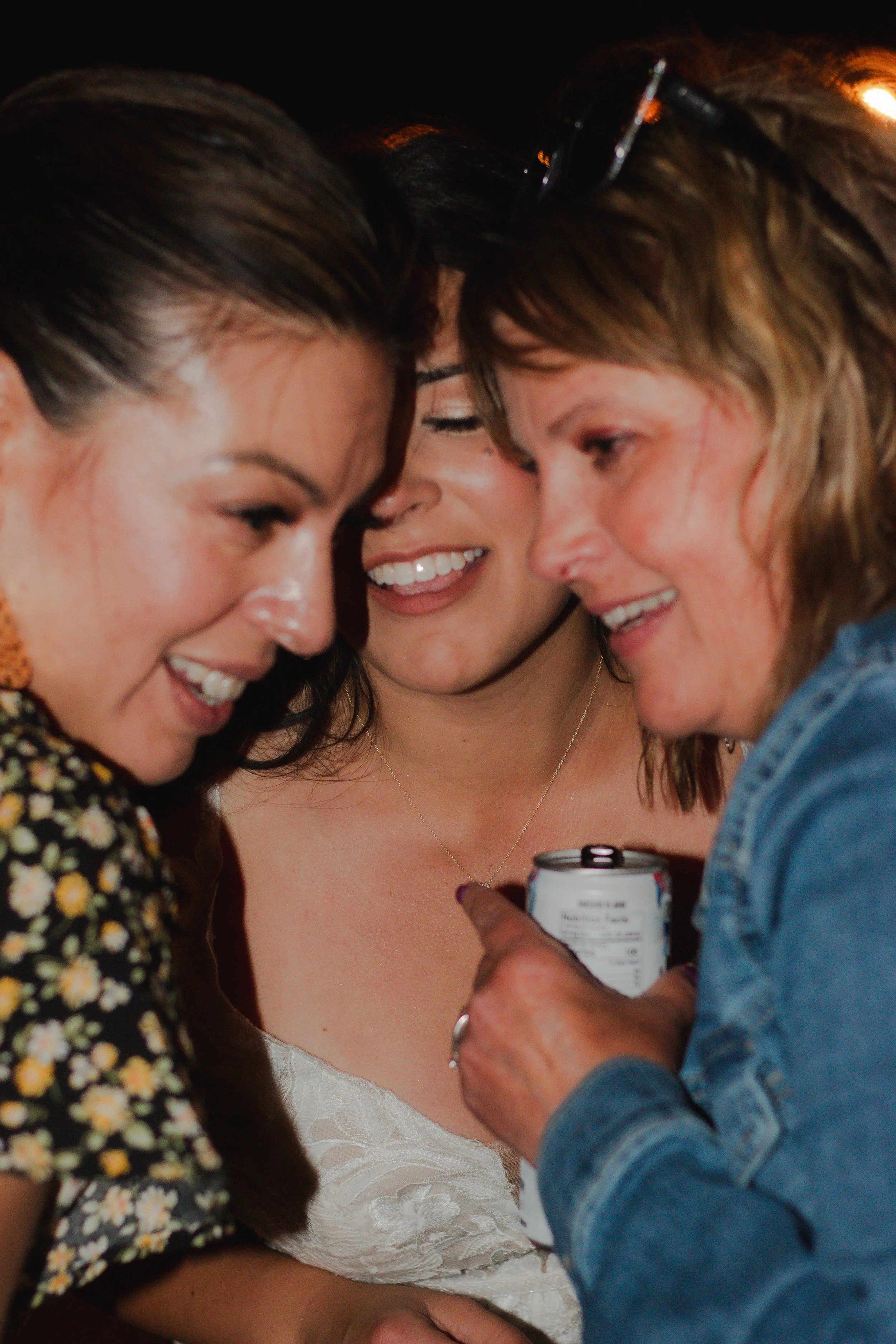  Wedding guests celebrating on the dance floor during a summer ranch wedding in Central Oregon 