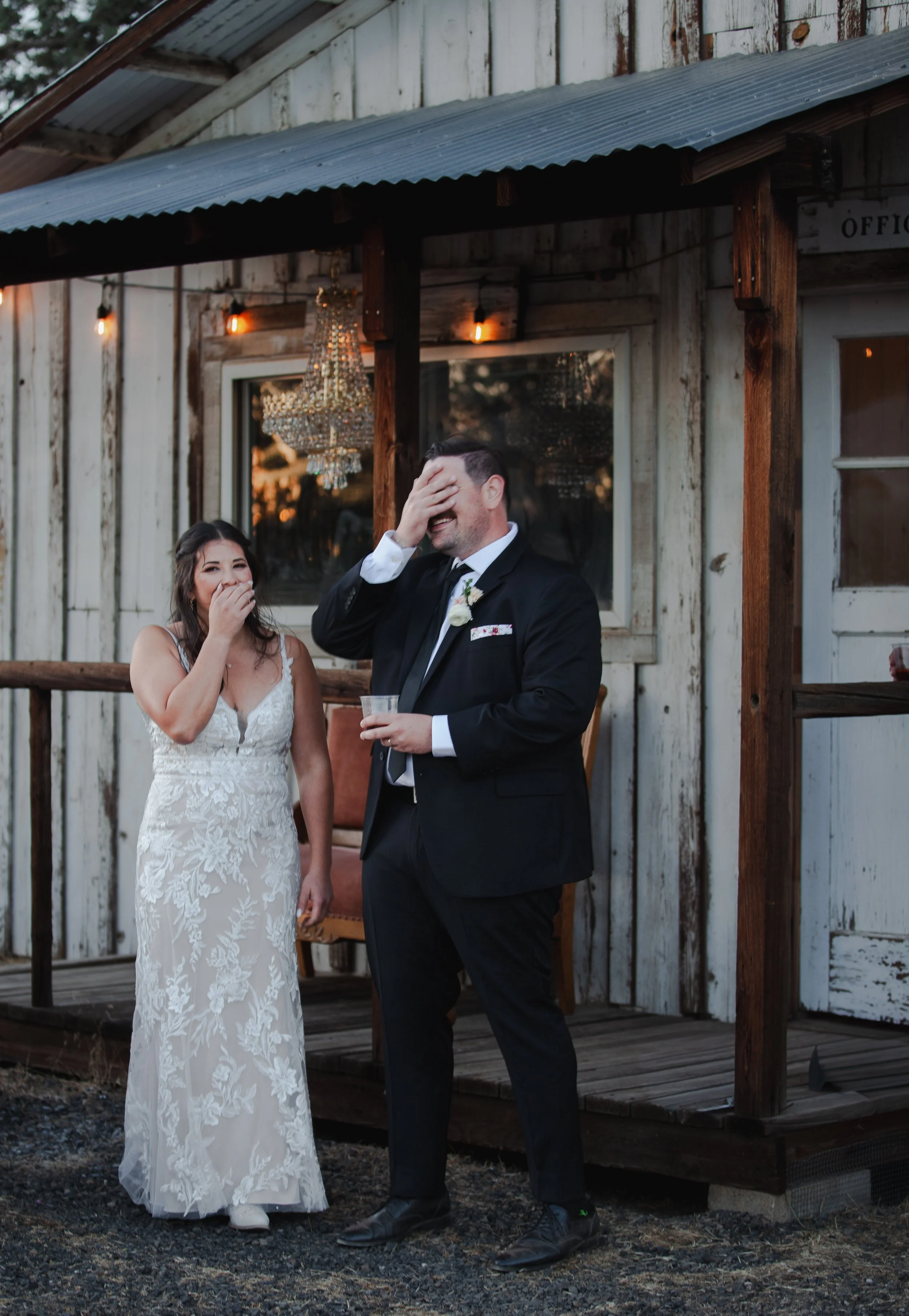  Bride and groom dancing beneath string lights at their private ranch wedding reception near Bend, Oregon 