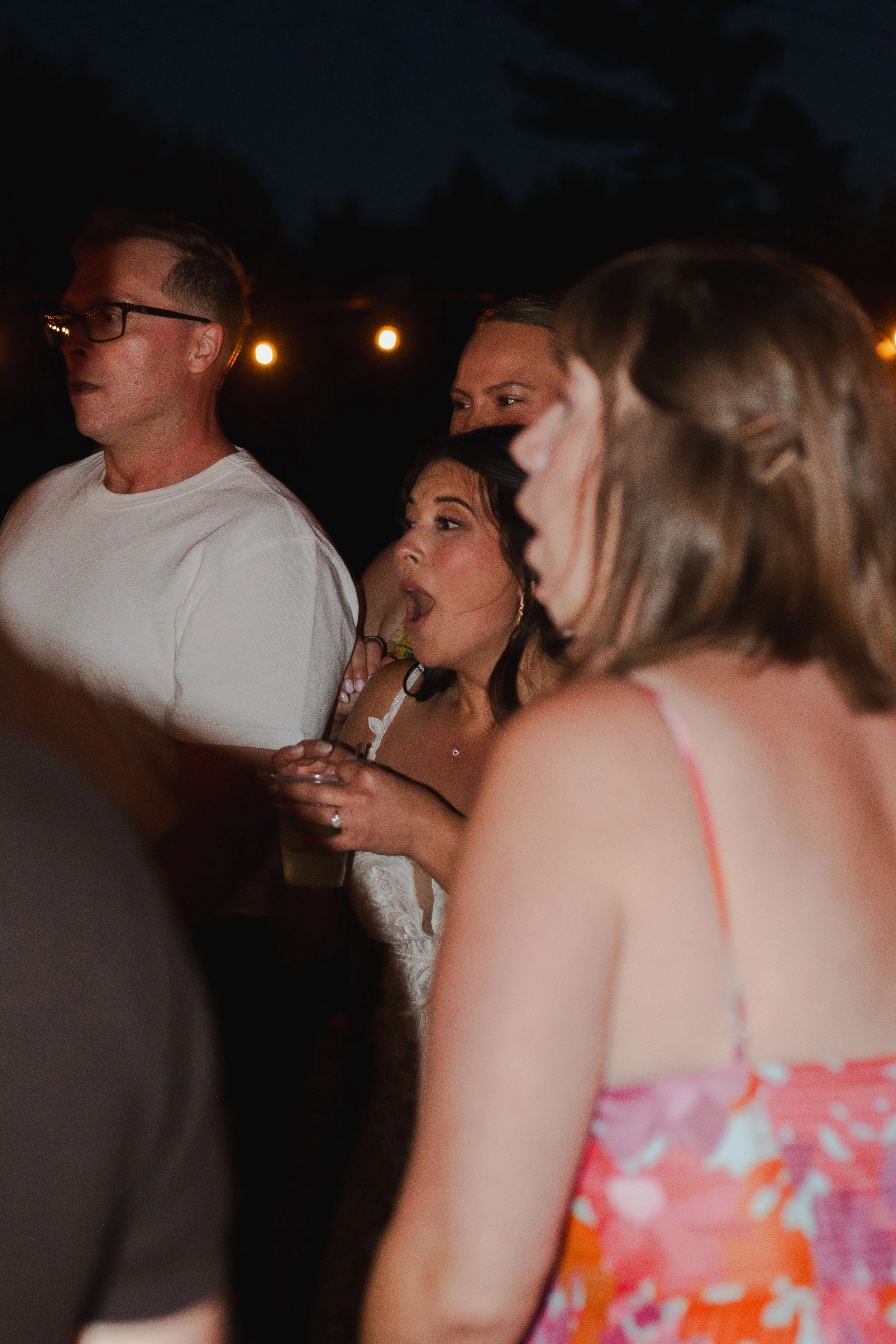  Packed wedding dance floor inside a string-lit ranch barn in Central Oregon 