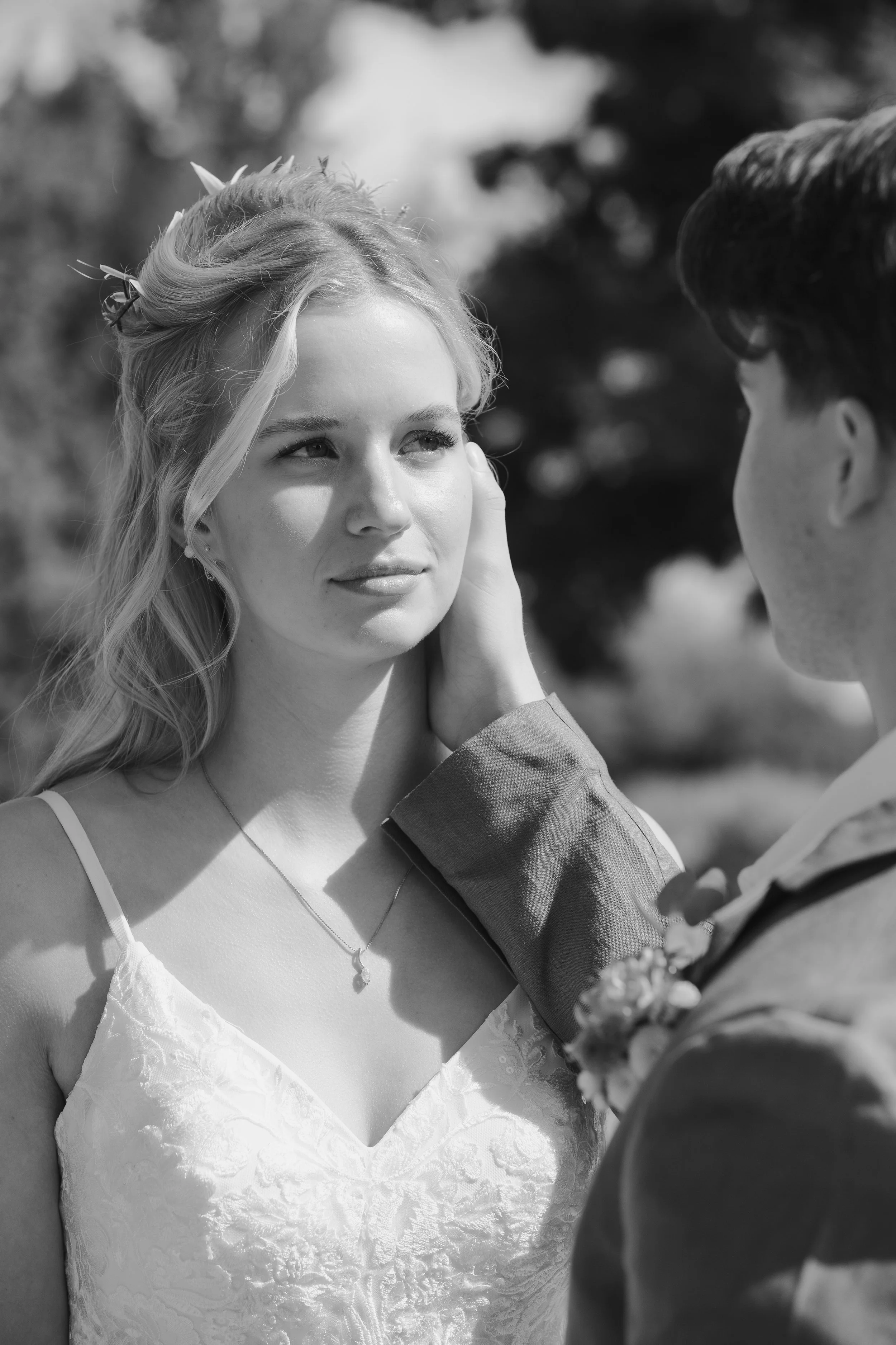 Newlyweds Liam and Gracie together in the gardens at Hanai Foundation in Bend, Oregon.