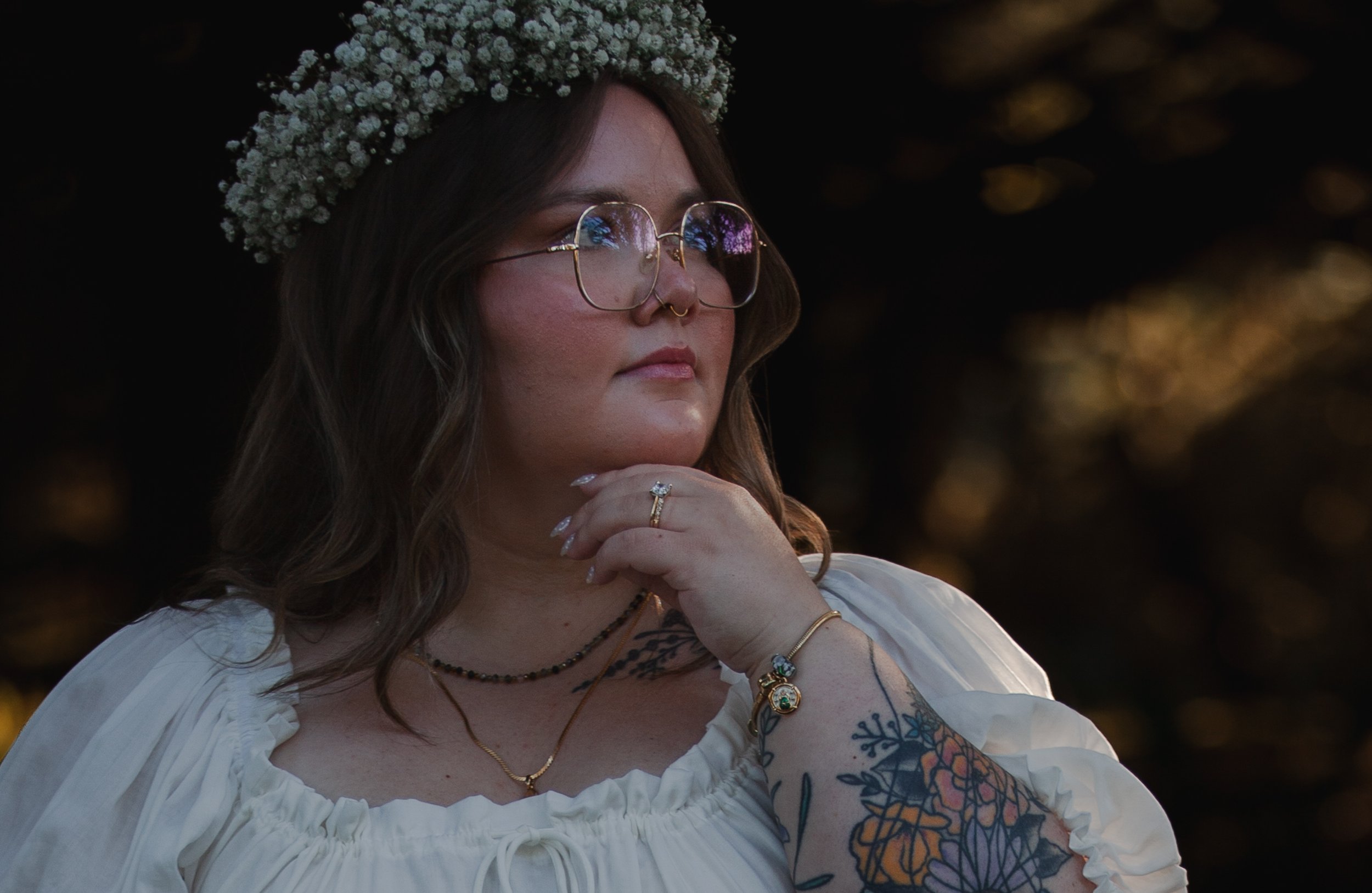 Editorial Oregon Coast engagement portrait with bride-to-be wearing a flower crown