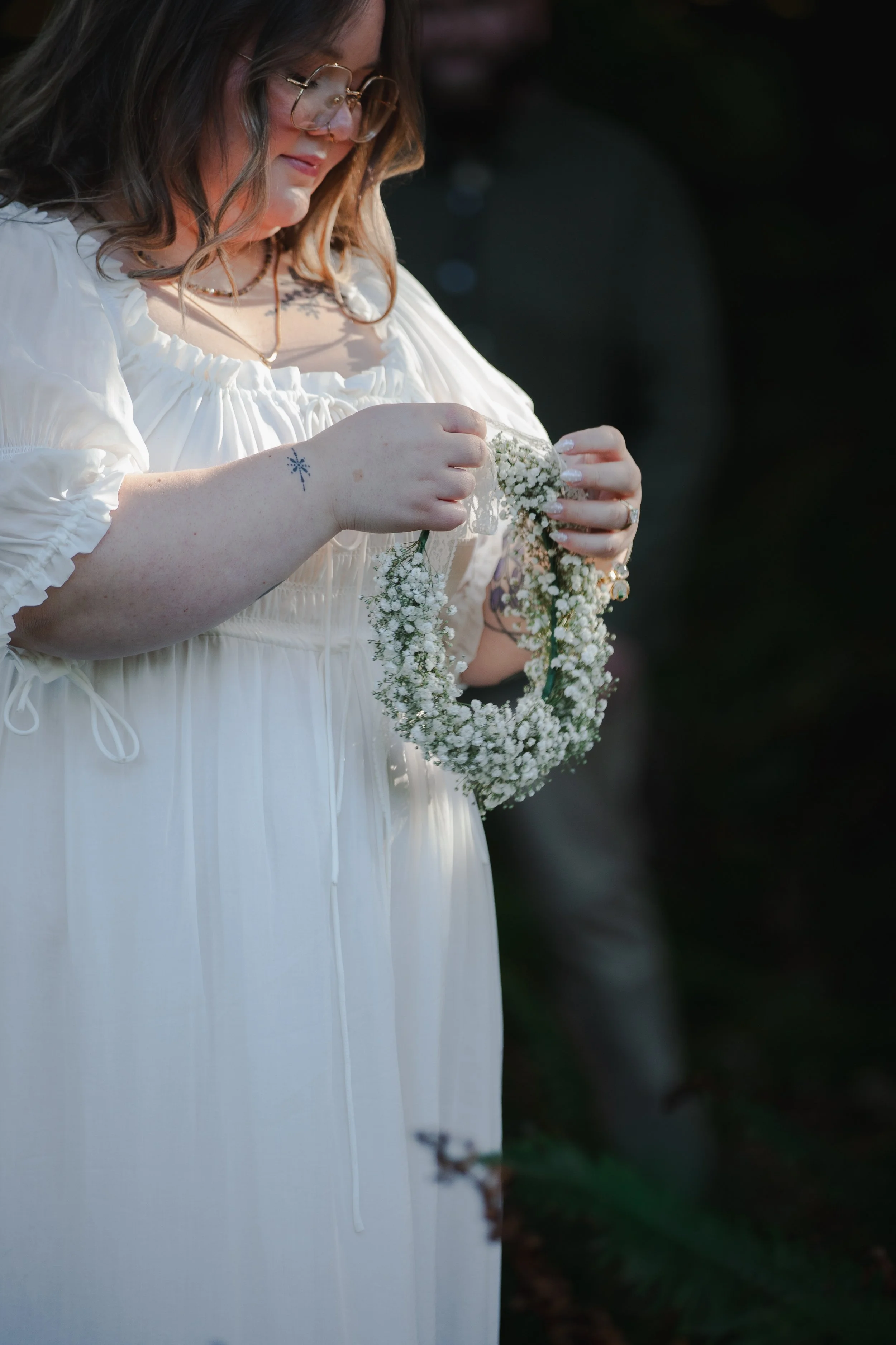 Editorial Oregon Coast engagement portrait with bride-to-be wearing a flower crown