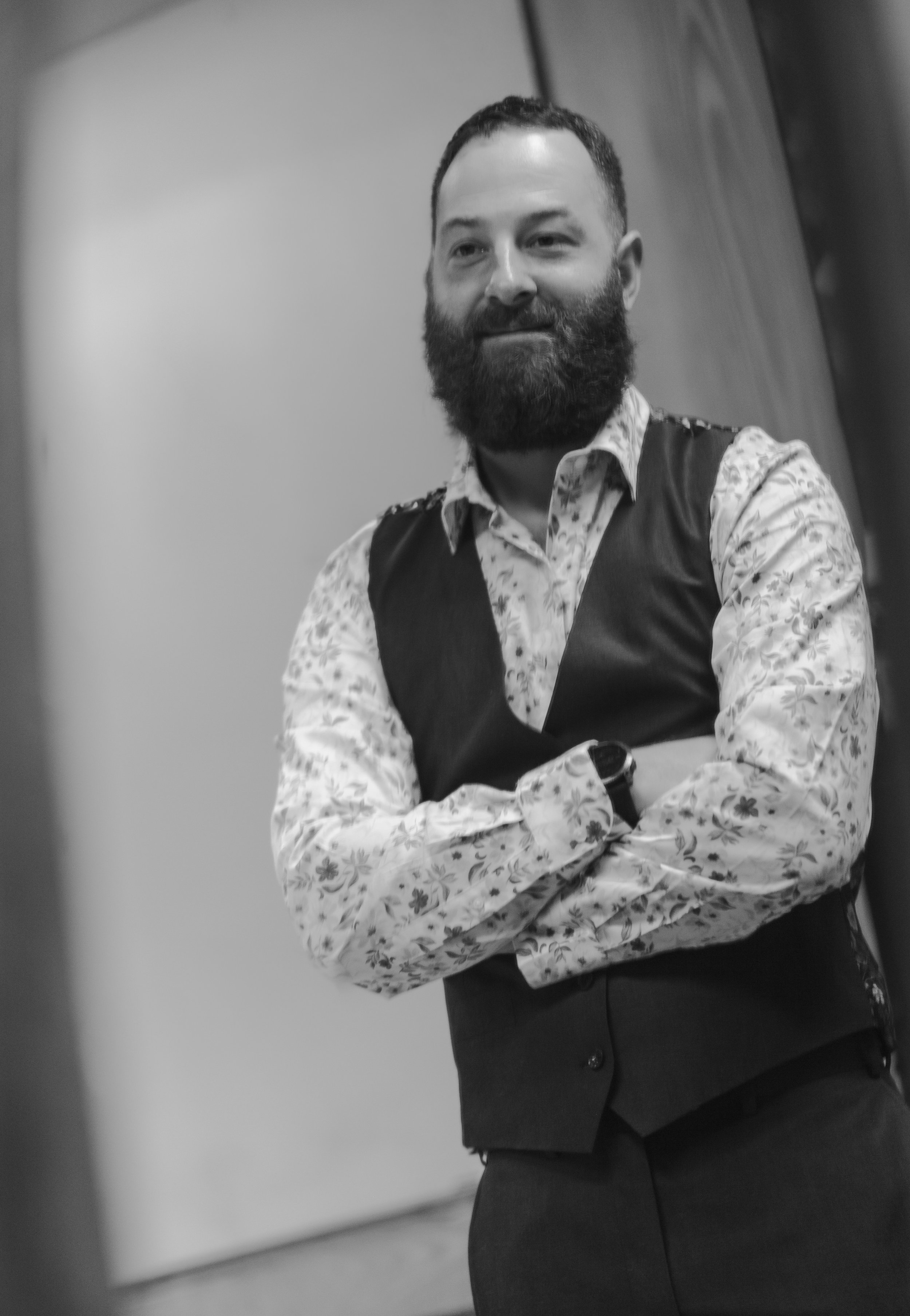 Black and white groom portrait during a High Desert Museum wedding near Bend, Oregon