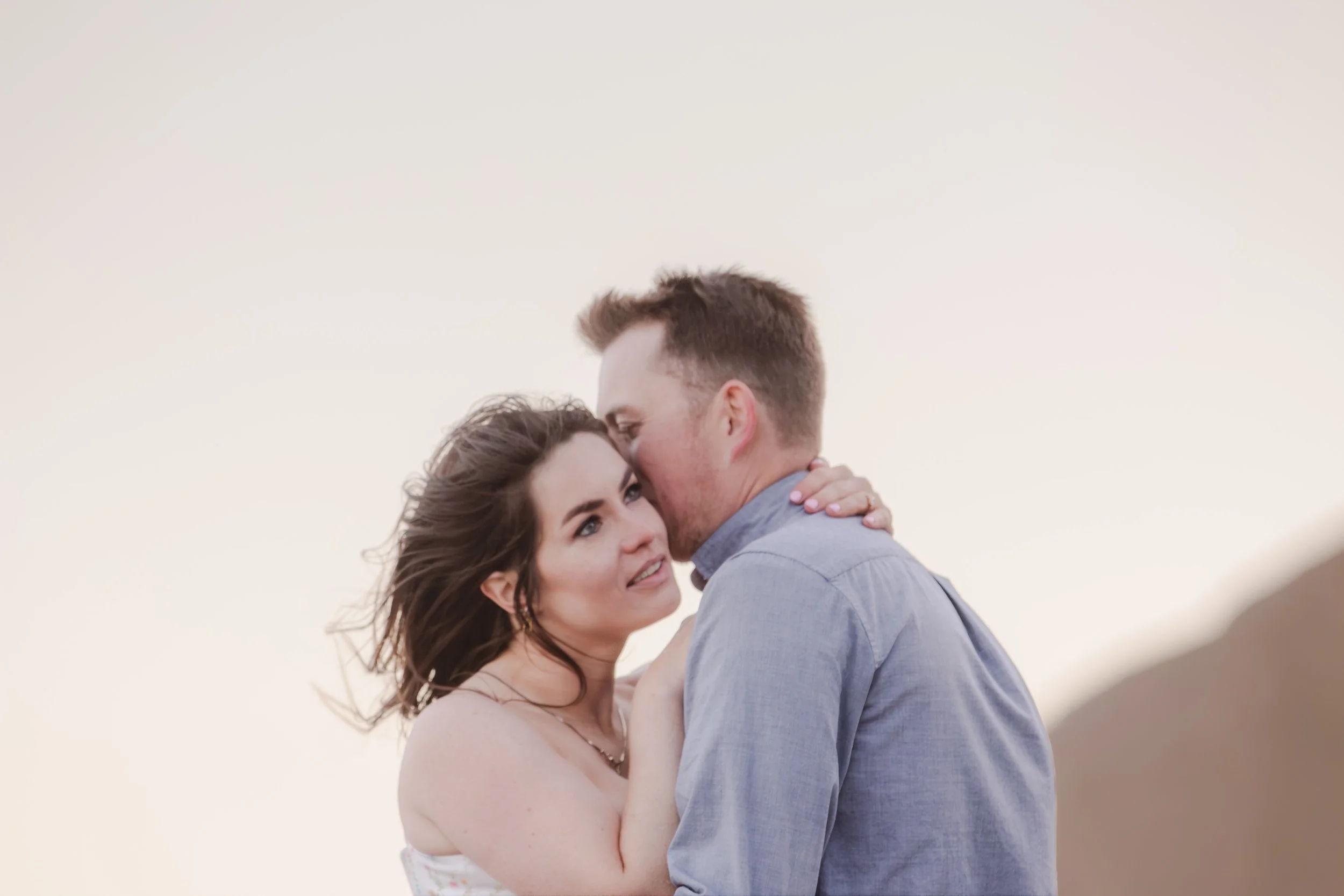 Candid engagement photography celebrating the moments between poses. Pacific City. Oregon Coast. 