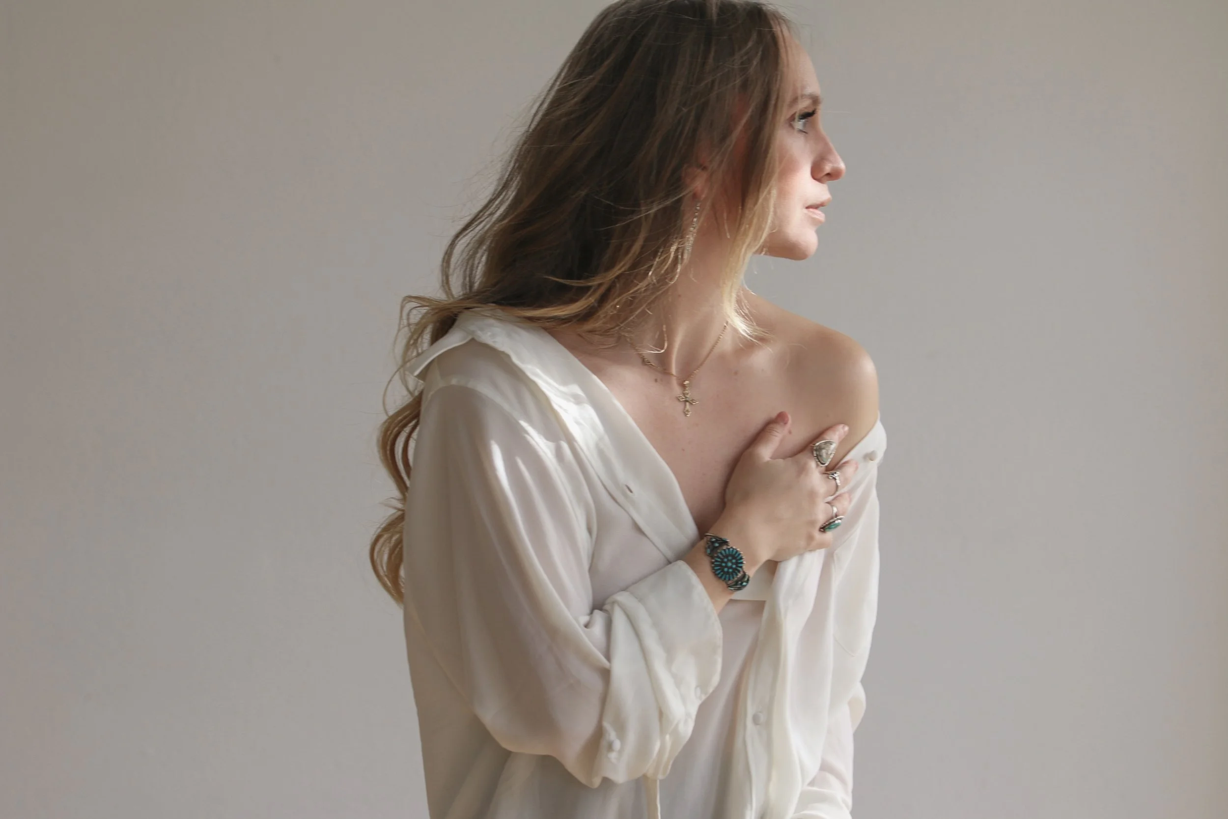 Editorial portrait of Dominique Noël reflecting her artistic vision inspired by old-world elegance, natural light, and the landscapes of the American West.