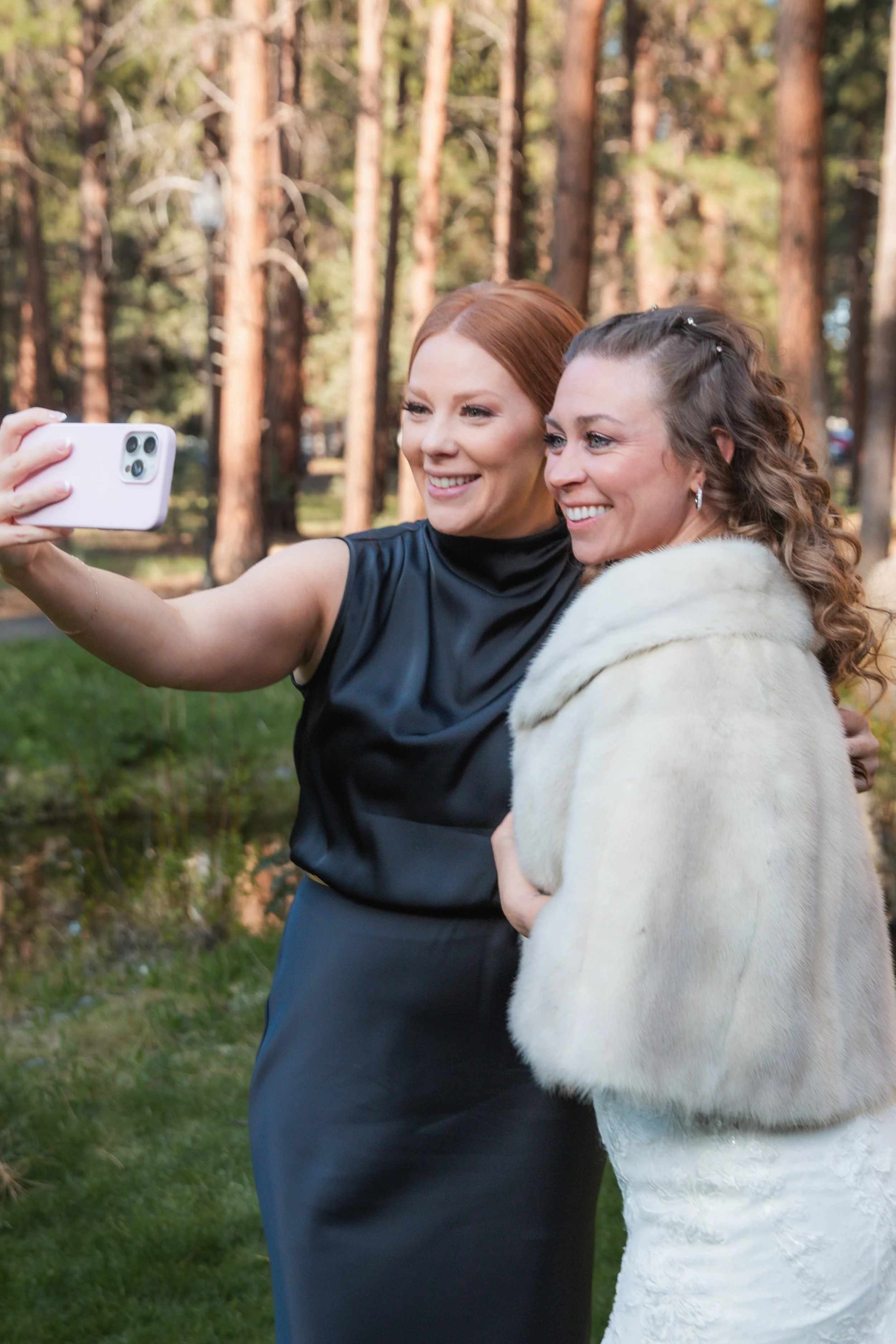 Emotional embrace between family members during the wedding celebration. Five Pine Lodge. Sisters Oregon. 