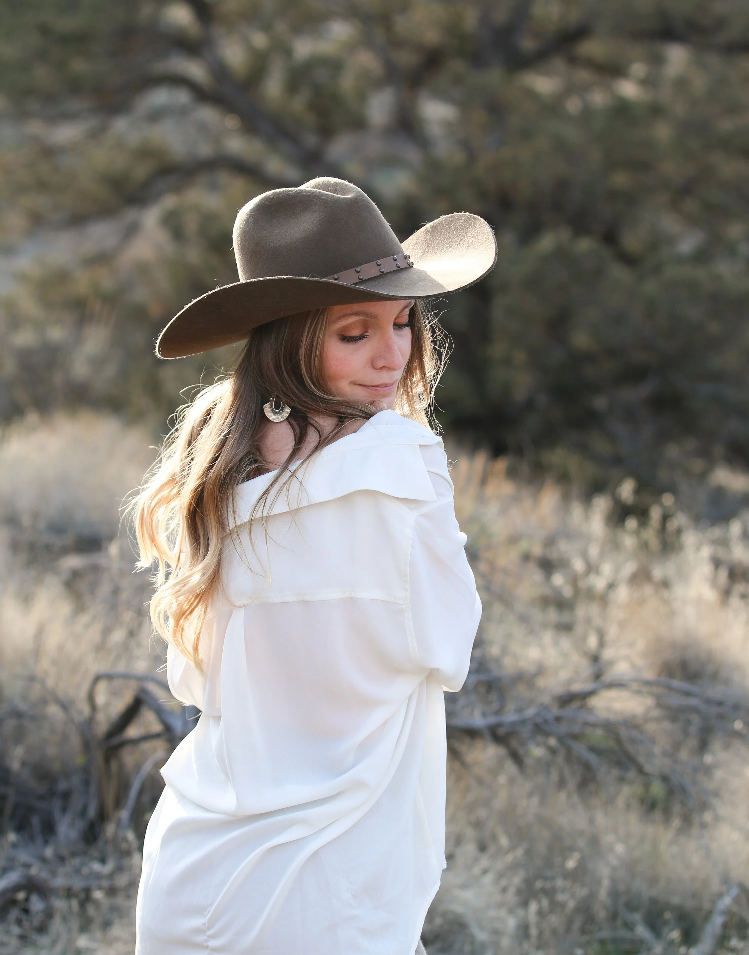 Editorial portrait of Dominique Noël reflecting her artistic vision inspired by old-world elegance, natural light, and the landscapes of the American West