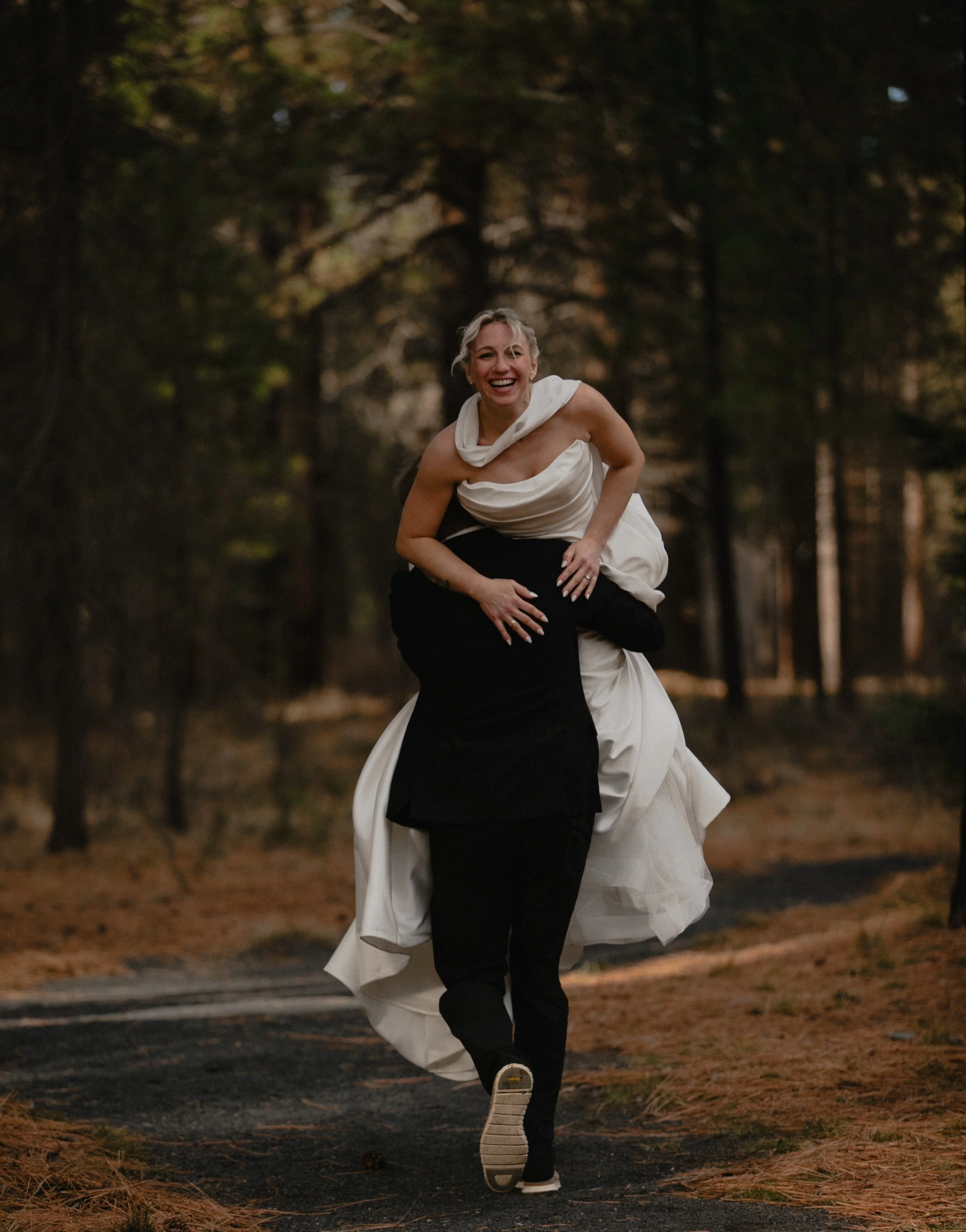 Couple celebrating together during an Oregon wedding, photographed with joyful editorial storytelling by Dominique Noël Photography.