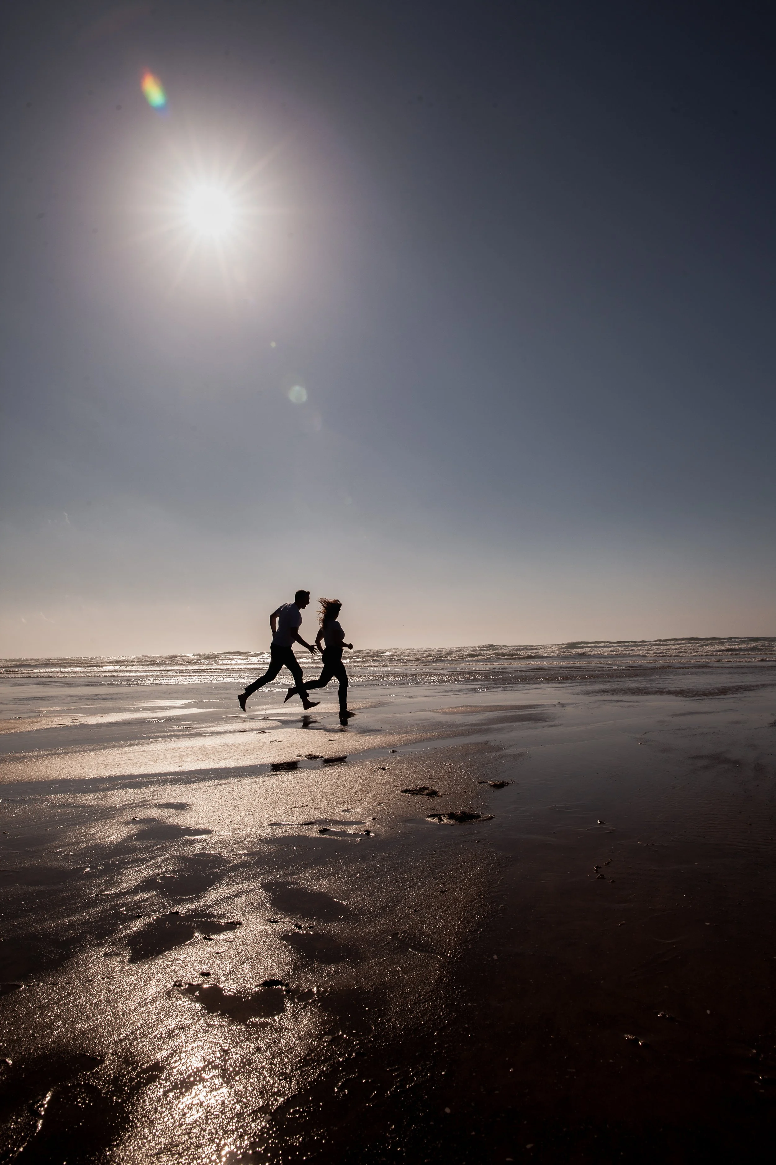 Playful engagement portrait inspired by timeless love stories. Oregon Coast.