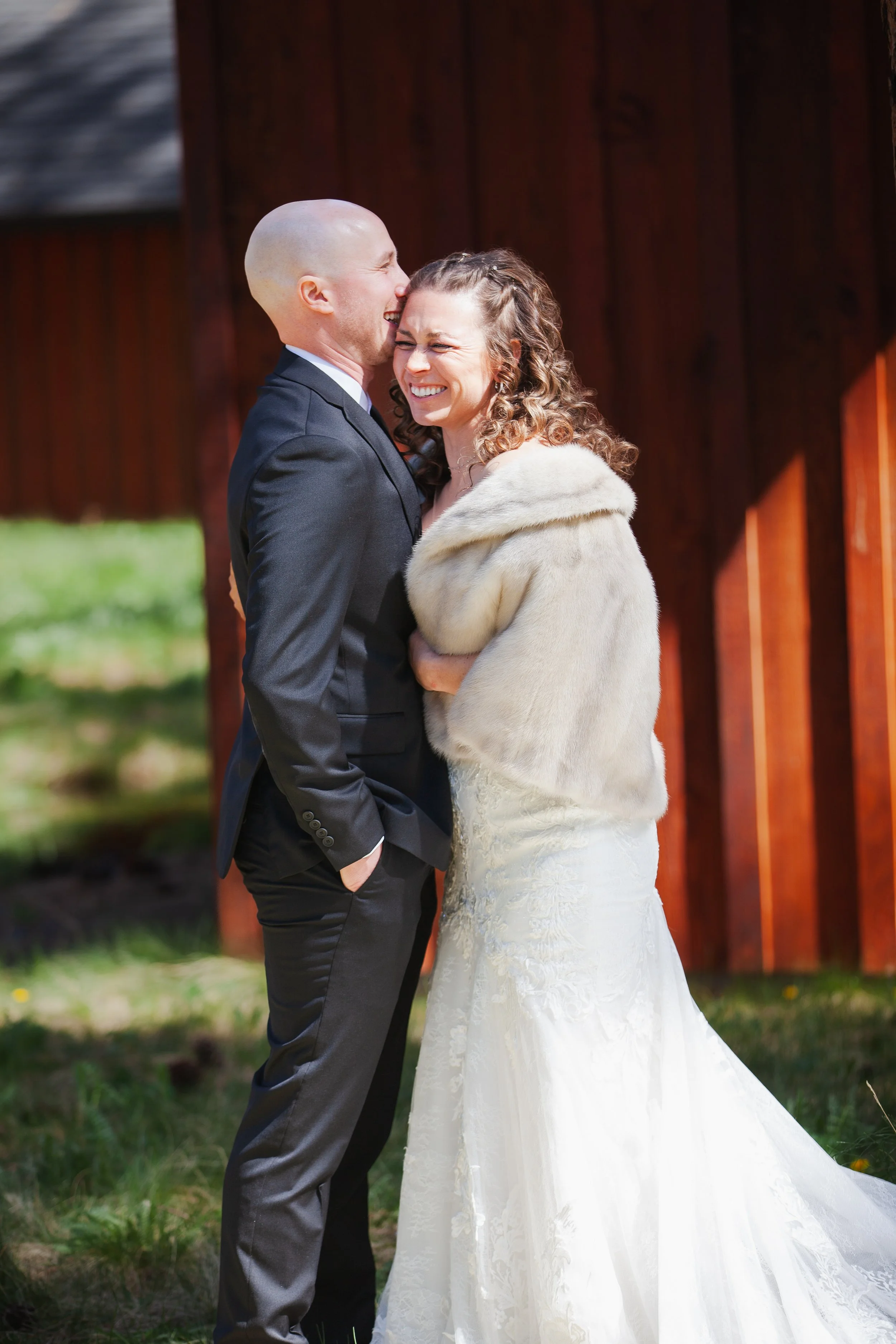 Bride laughing during relaxed wedding portraits. Sisters Oregon.