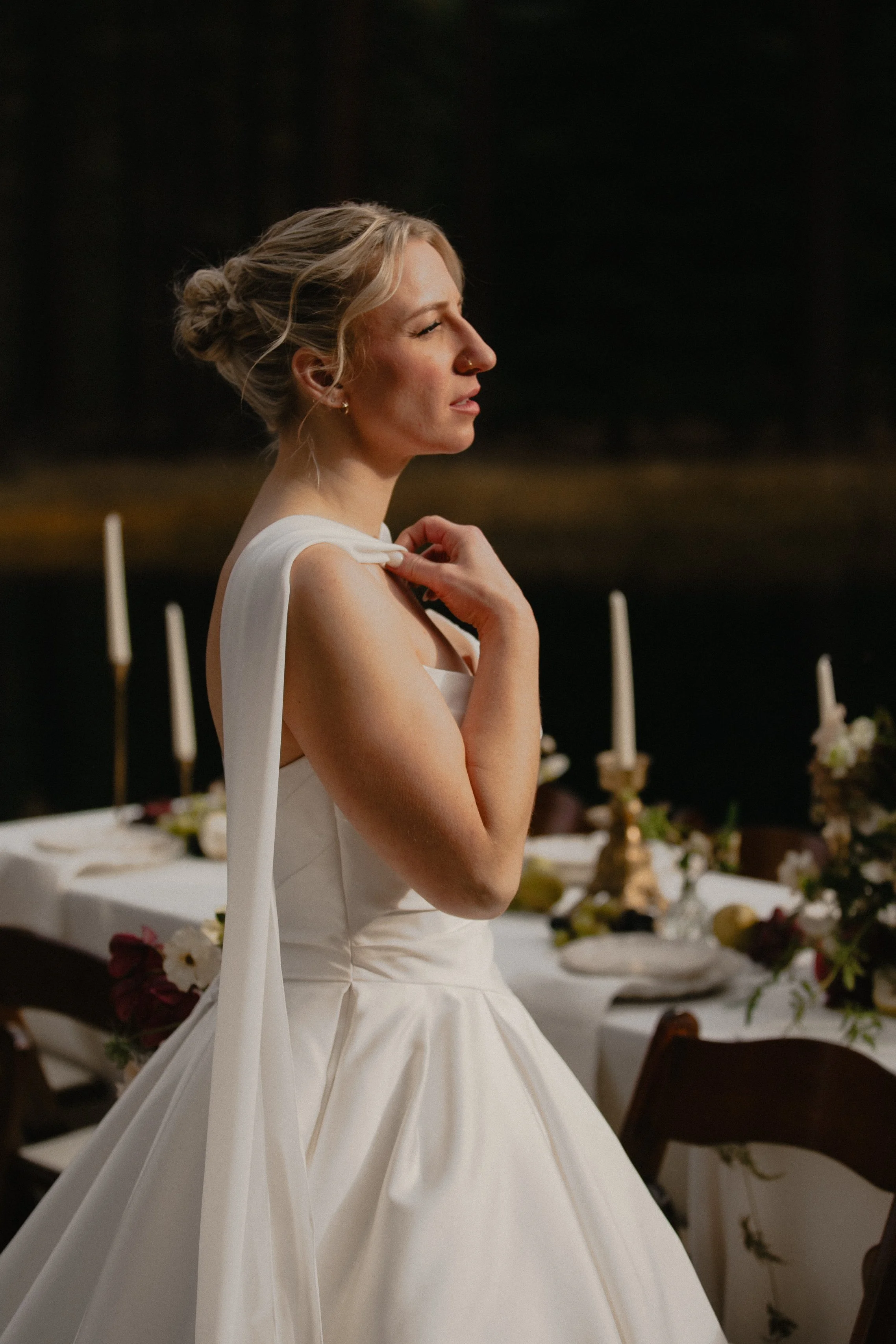 Fashion-inspired bridal portrait featuring a sculptural white gown and scarf neckline in Camp Sherman.