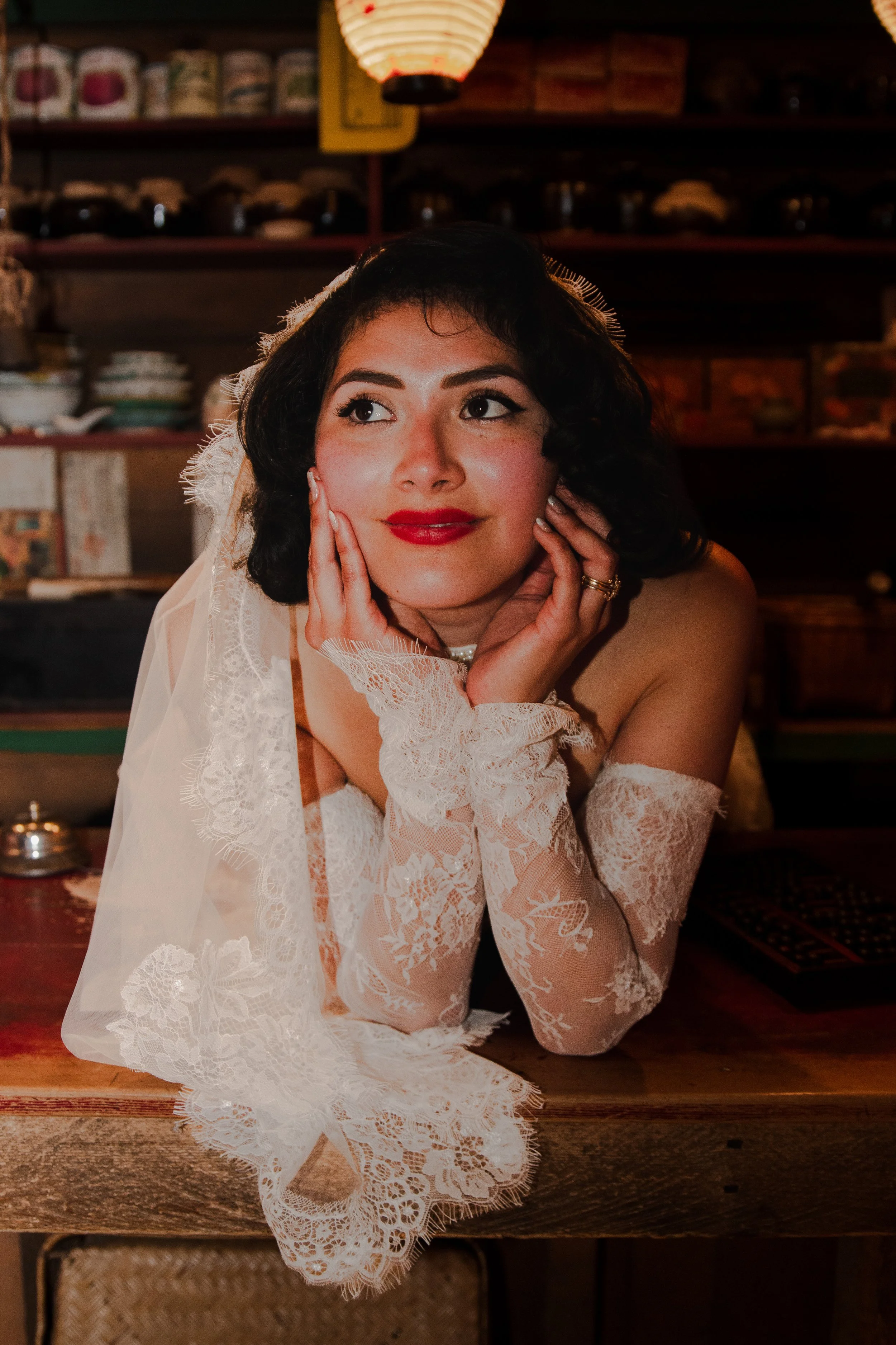 Bride in a vintage-inspired wedding gown photographed inside the High Desert Museum near Bend, Oregon