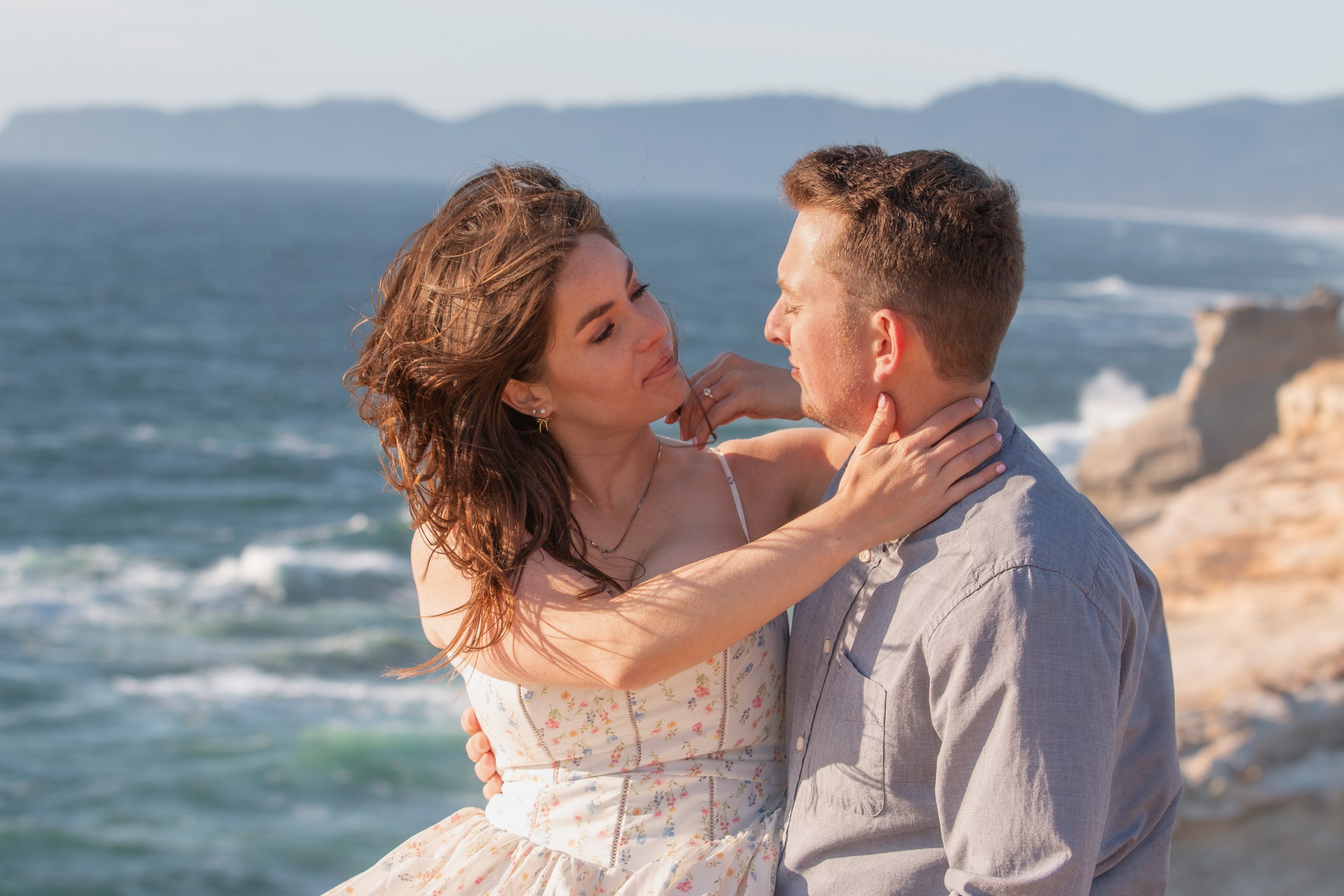 Candid engagement photography celebrating the moments between poses. Pacific City. Oregon Coast. 