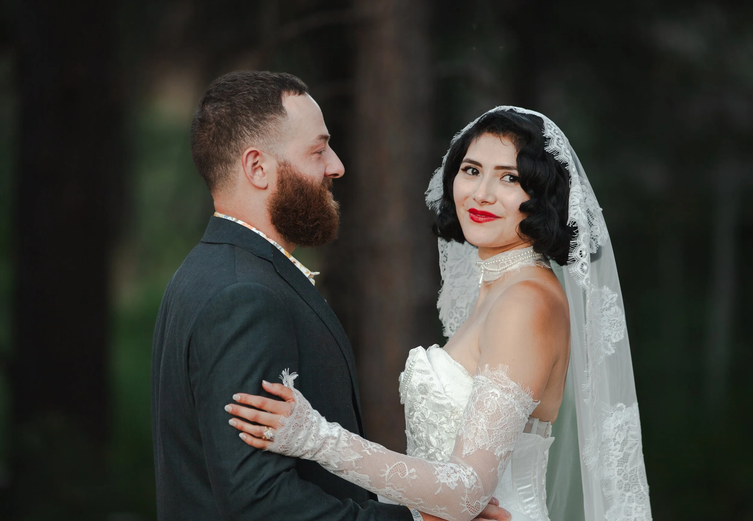 Bride and groom portrait among the pine trees during their High Desert Museum wedding in Central Oregon